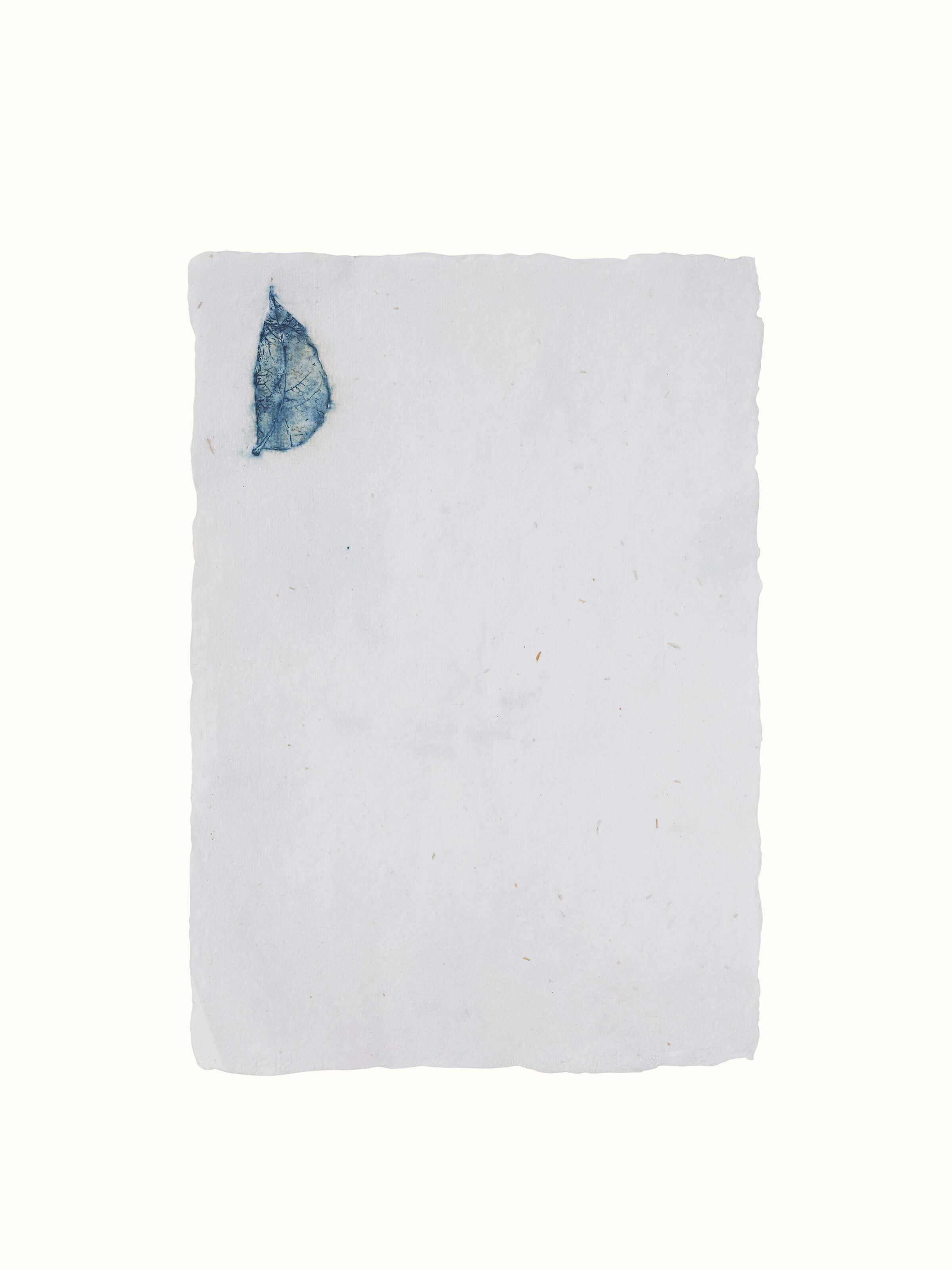Front view of Auroville handmade paper sheets in white, highlighting their premium finish.