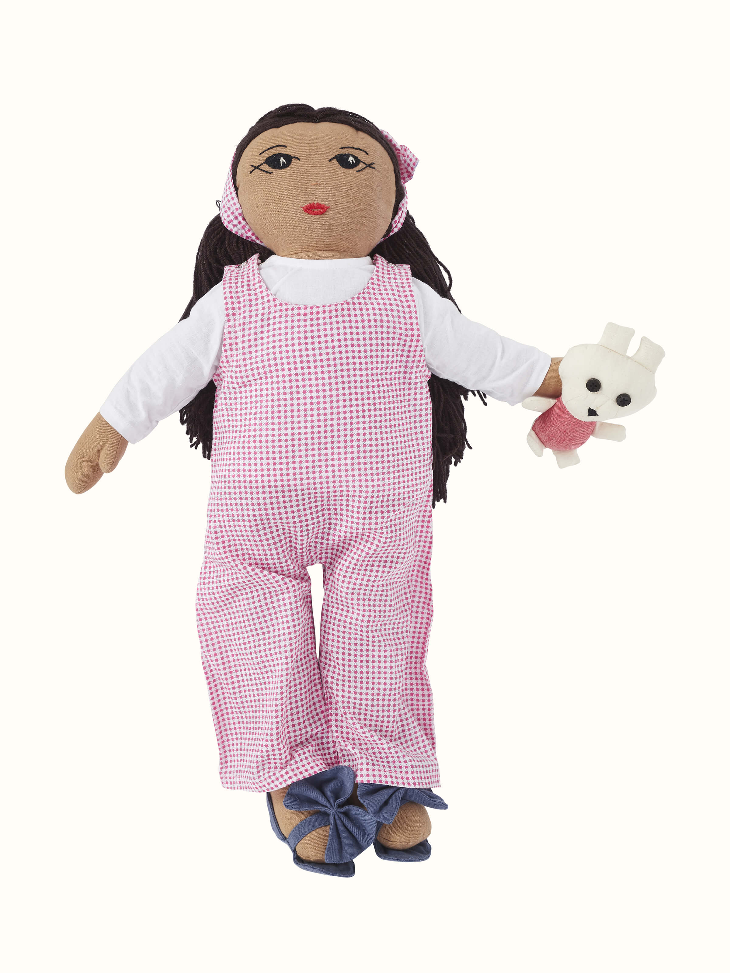 Close-up view of Cotton & polyester doll set in pink, emphasizing the fine details and quality of the fabric.