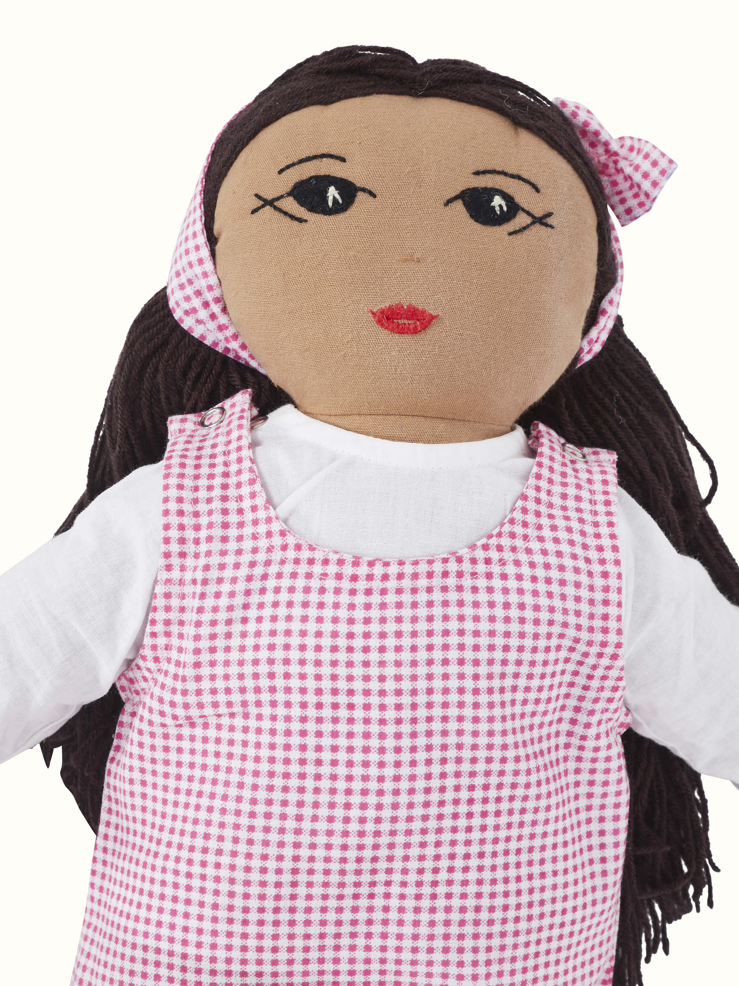Detailed view of Cotton & polyester doll set in pink, showcasing the intricate patterns and high-quality stitching.