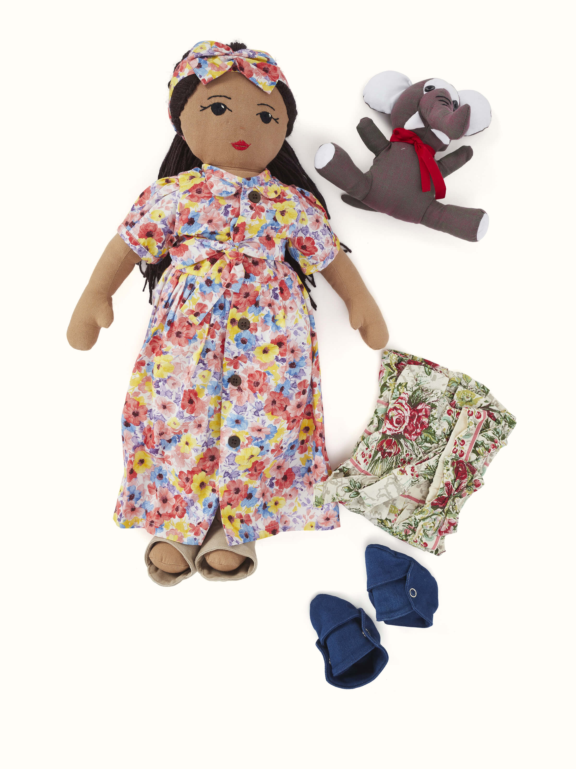 Front view of Cotton & Polyester Doll Dress Set showcasing vibrant colors and playful patterns.