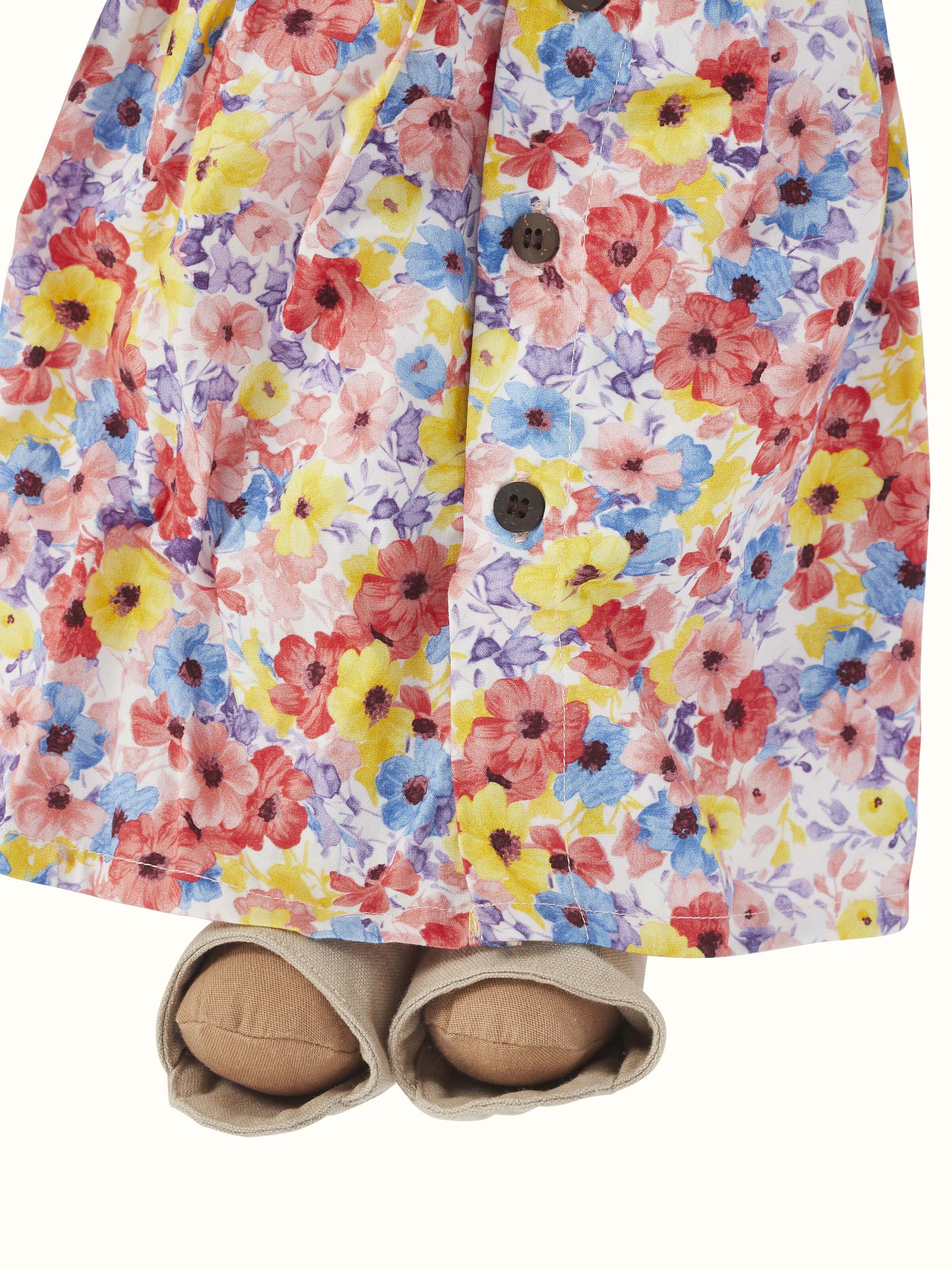 Close-up view of Cotton & Polyester Doll Dress Set highlighting the fabric texture and design details.