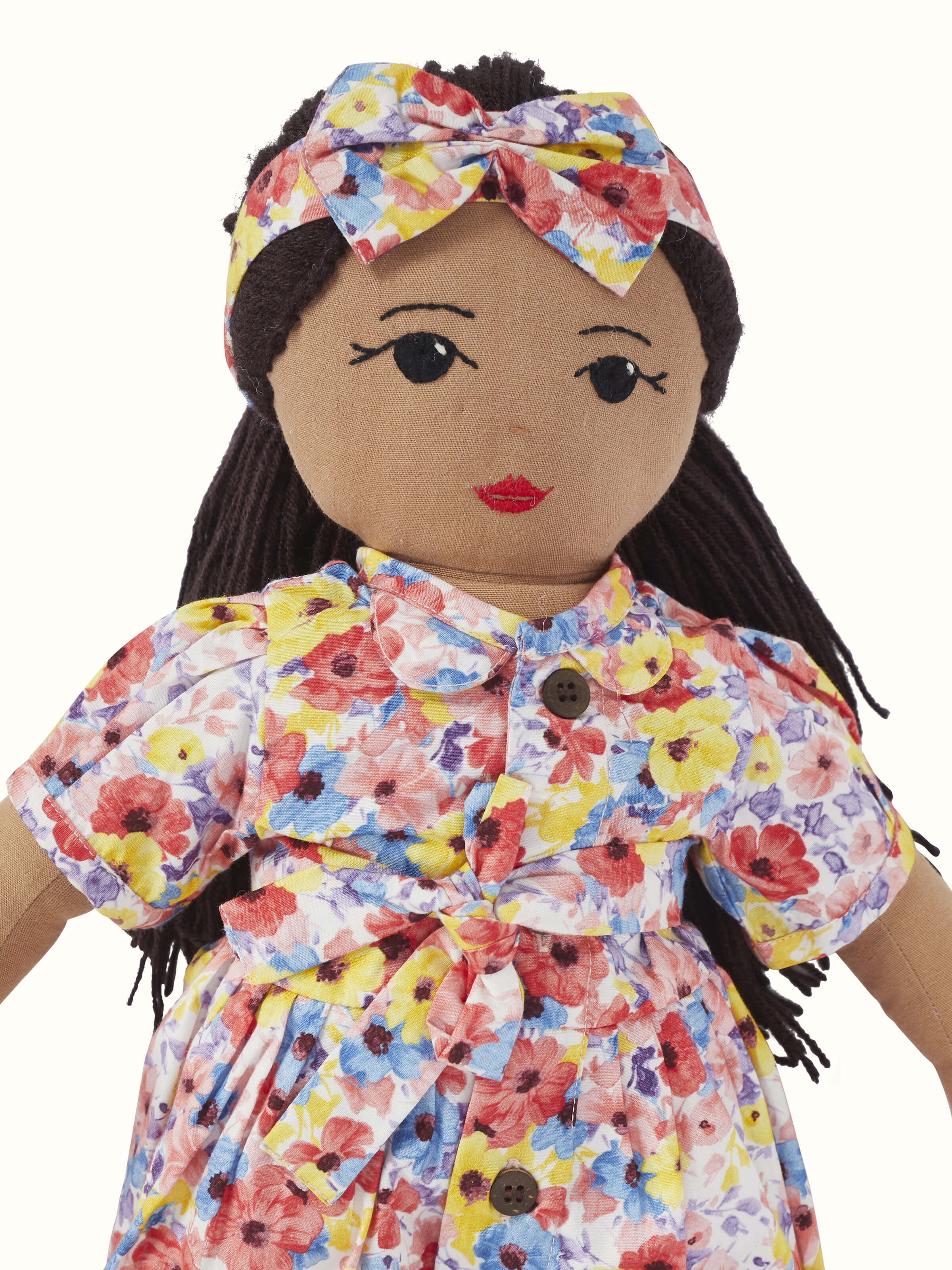 Detailed view of Cotton & Polyester Doll Dress Set showcasing the stitching and color contrasts.