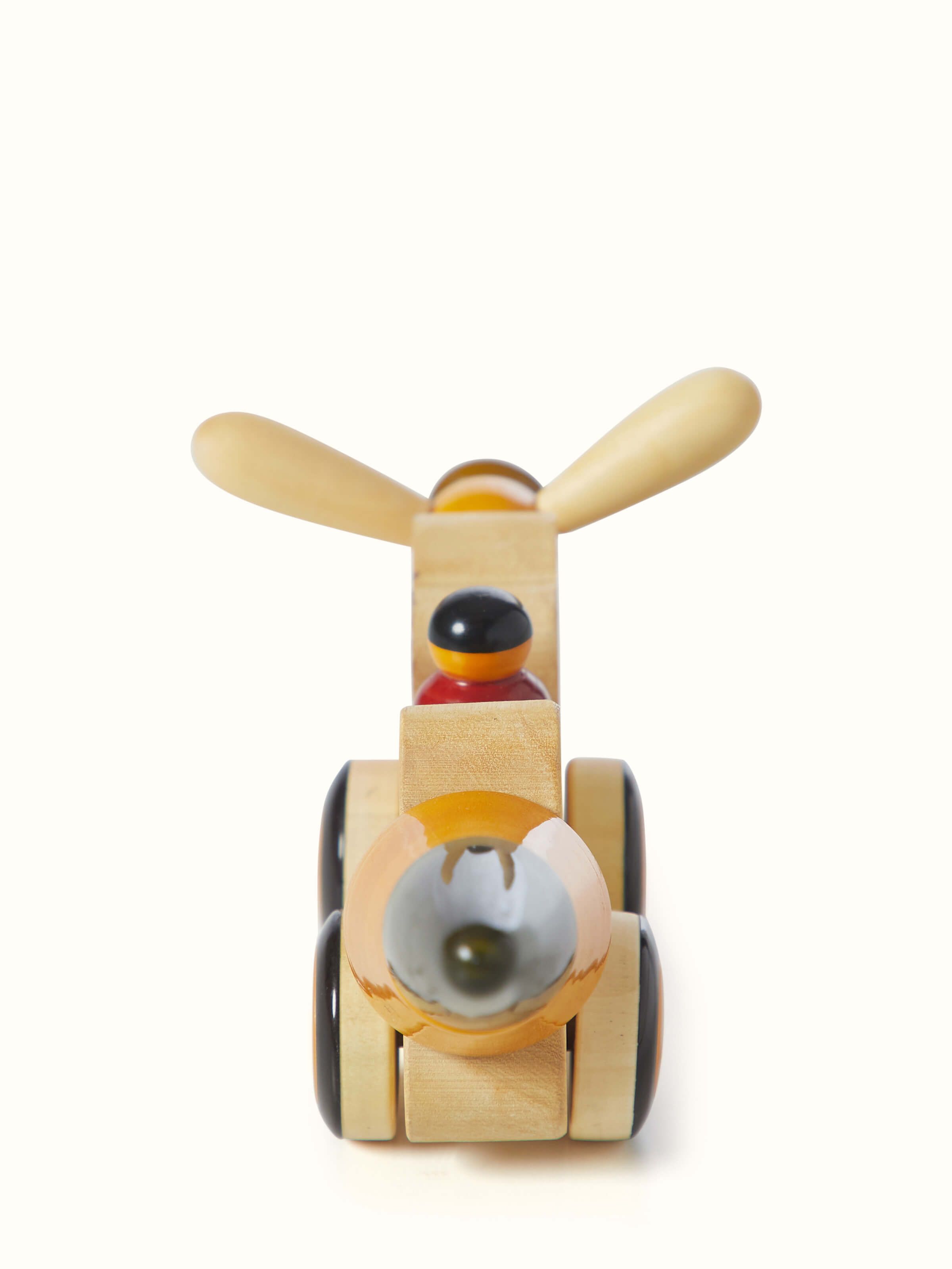 Close-up of Channapatna ivory wood chip chop yellow focusing on finish and texture