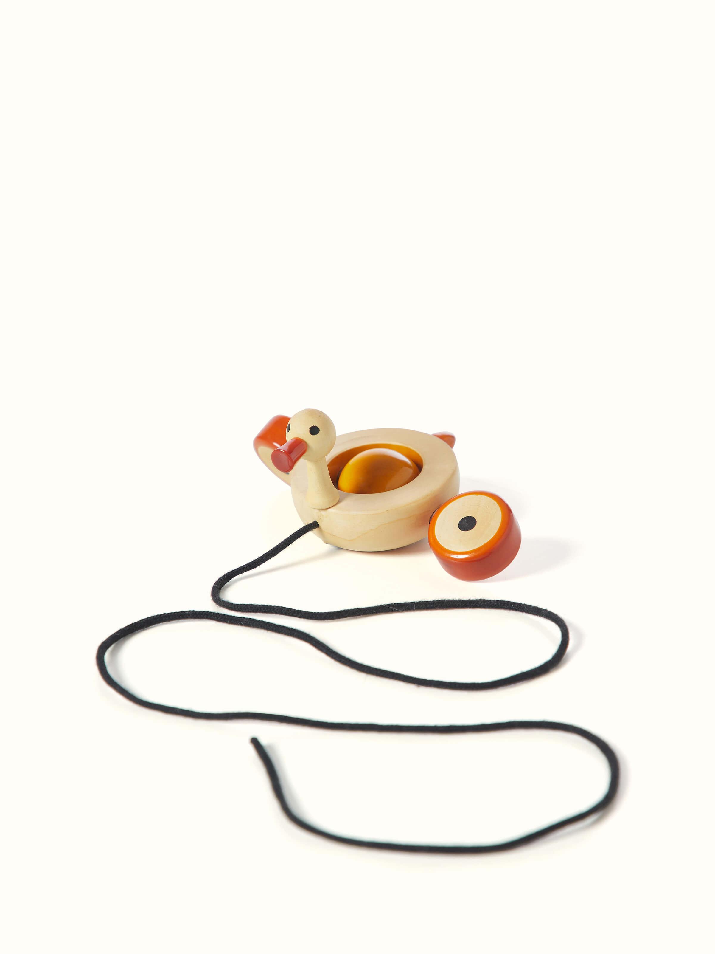 Top view of Channapatna Ivory Wood Duby Duck Toy, displaying the overall shape and details