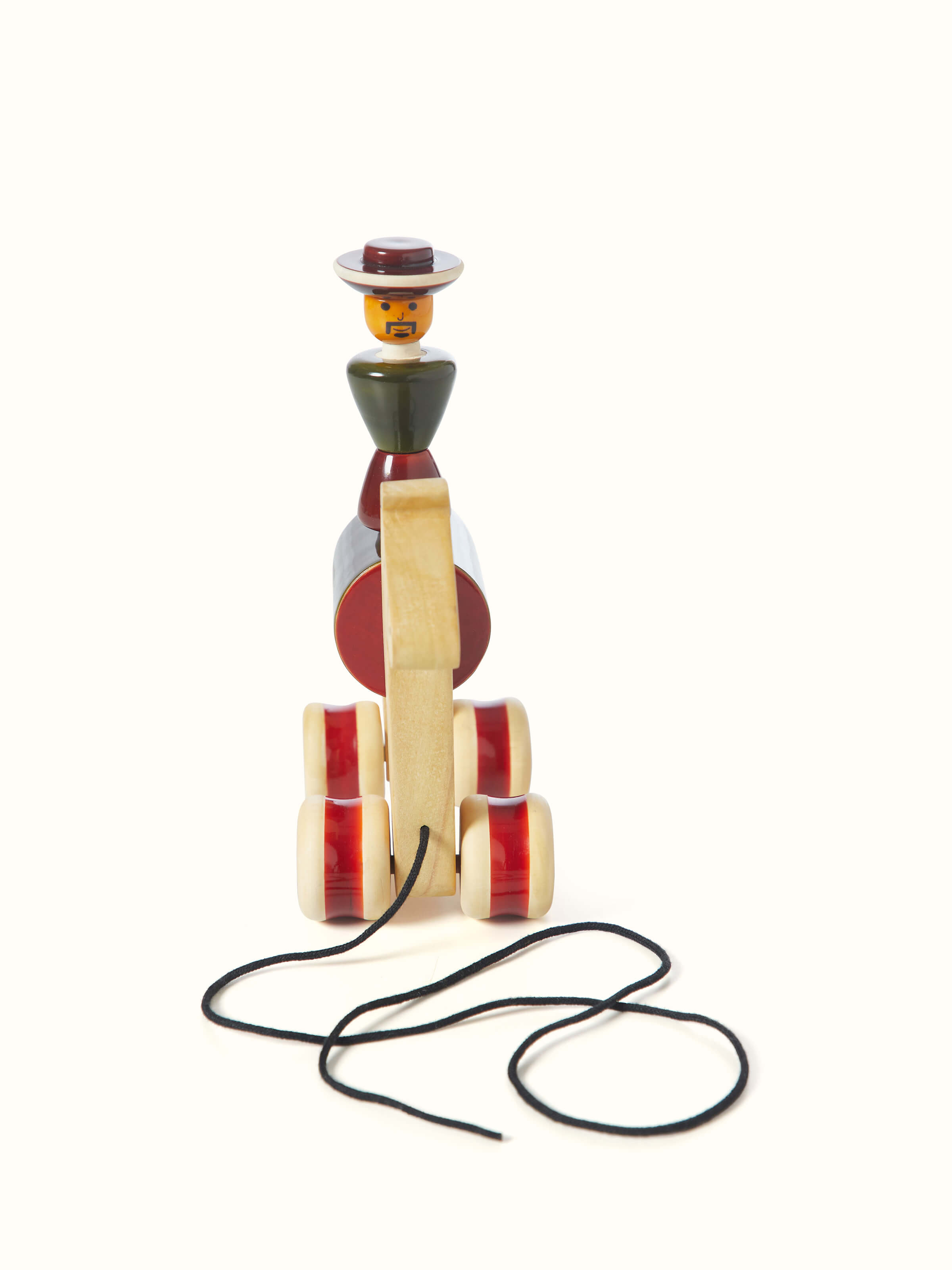 Back view of Channapatna Ivory Wood Man Rider Toy Green highlighting the rear design and wooden finish.