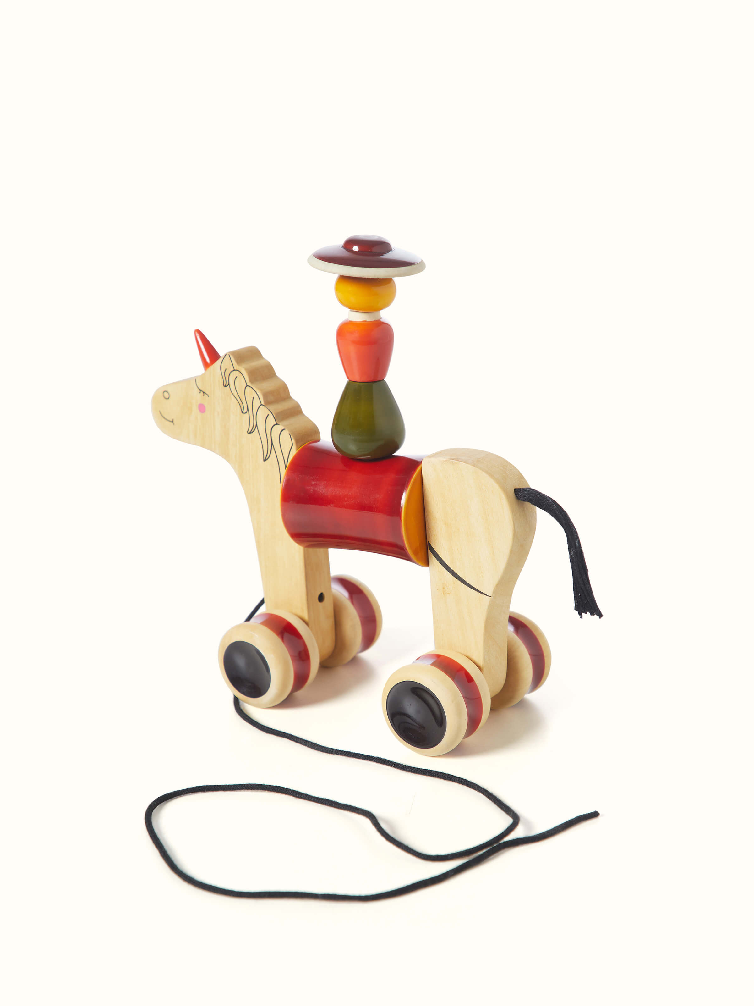 Alternate view of Channapatna Ivory Wood Woman Rider Hee Haw in red focusing on different angles and design elements.