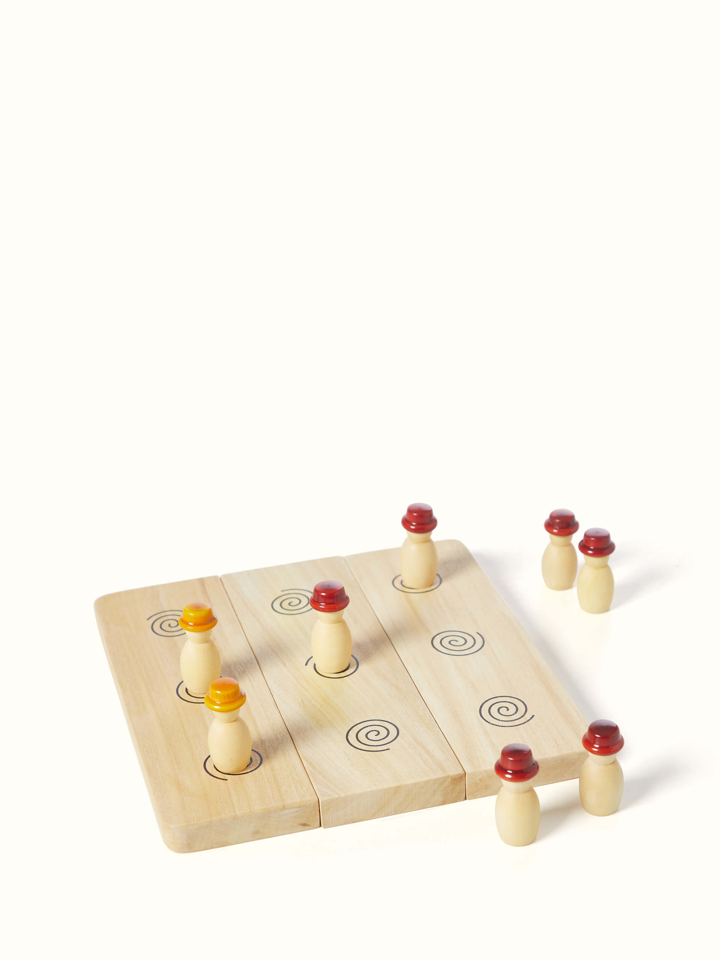 Front view of Channapatna ivory wood six men's morris off-white