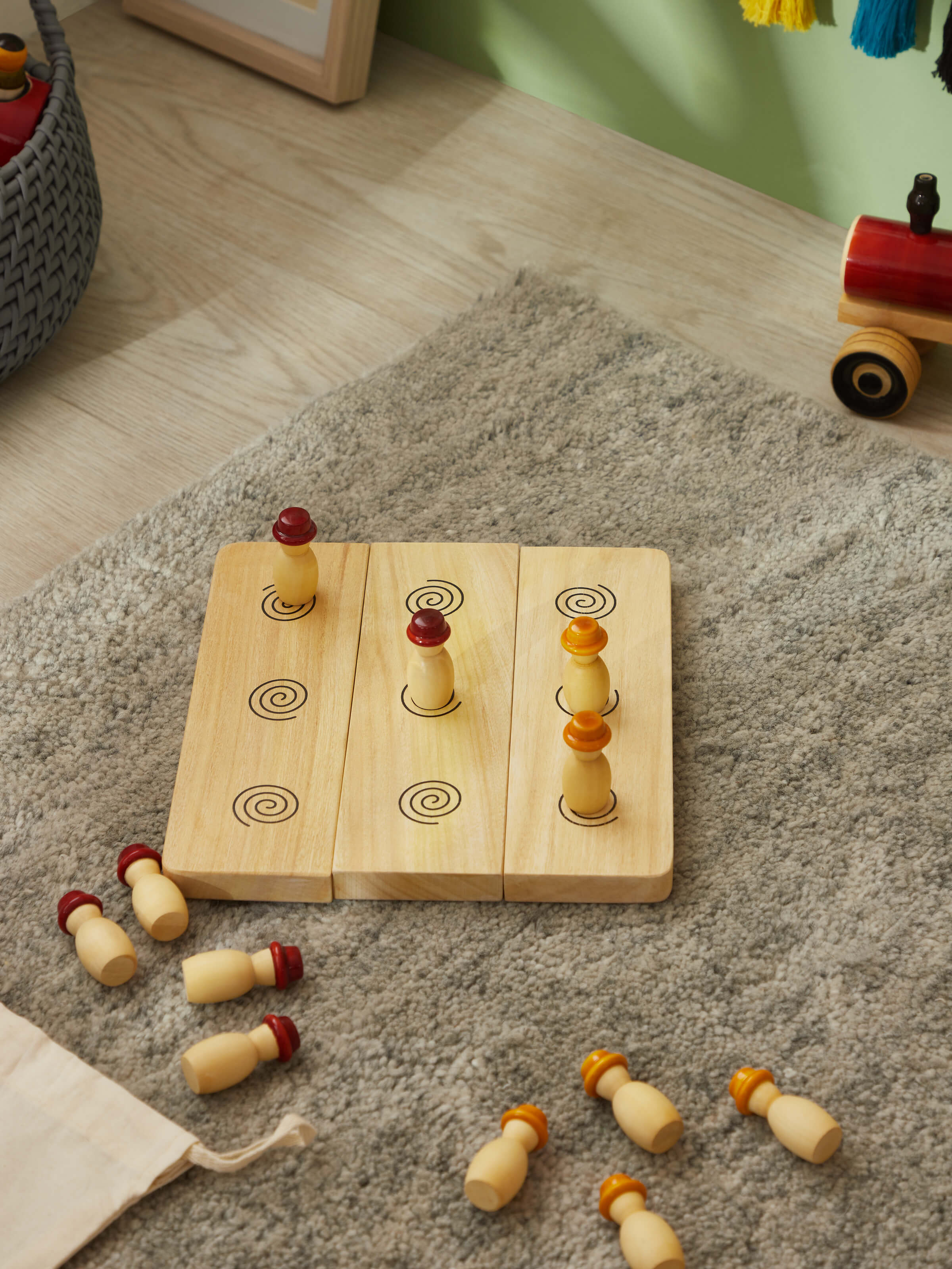 Detailed view of Channapatna ivory wood six men's morris off-white