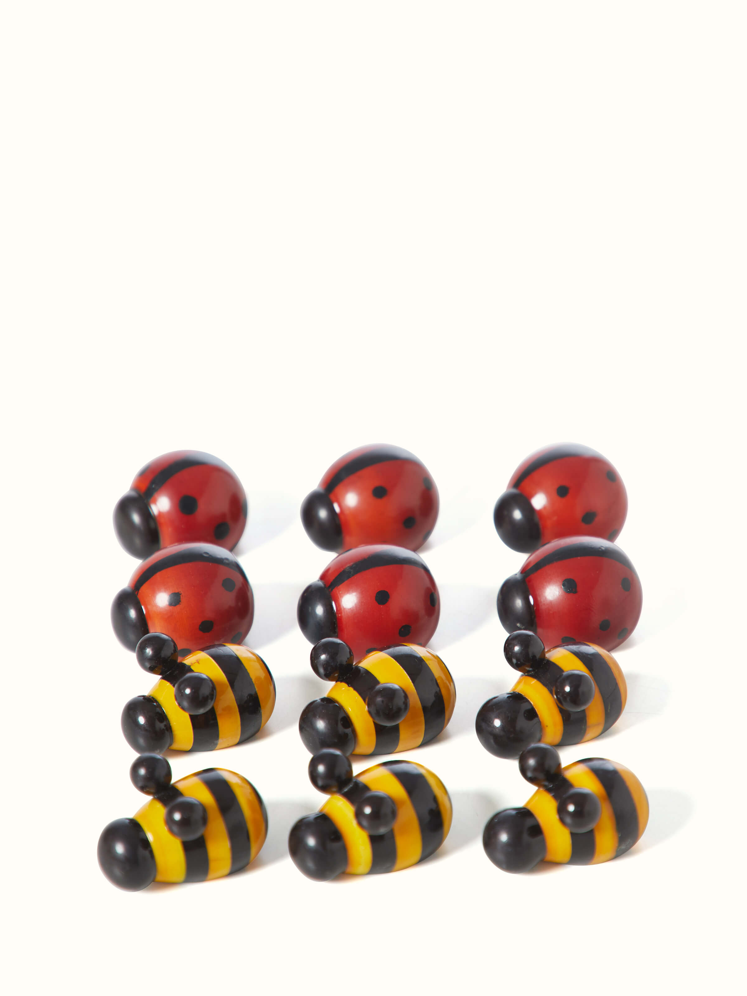 Alternative view of Channapatna ivory wood tic-tac-toe game focusing on its handcrafted details and overall aesthetics