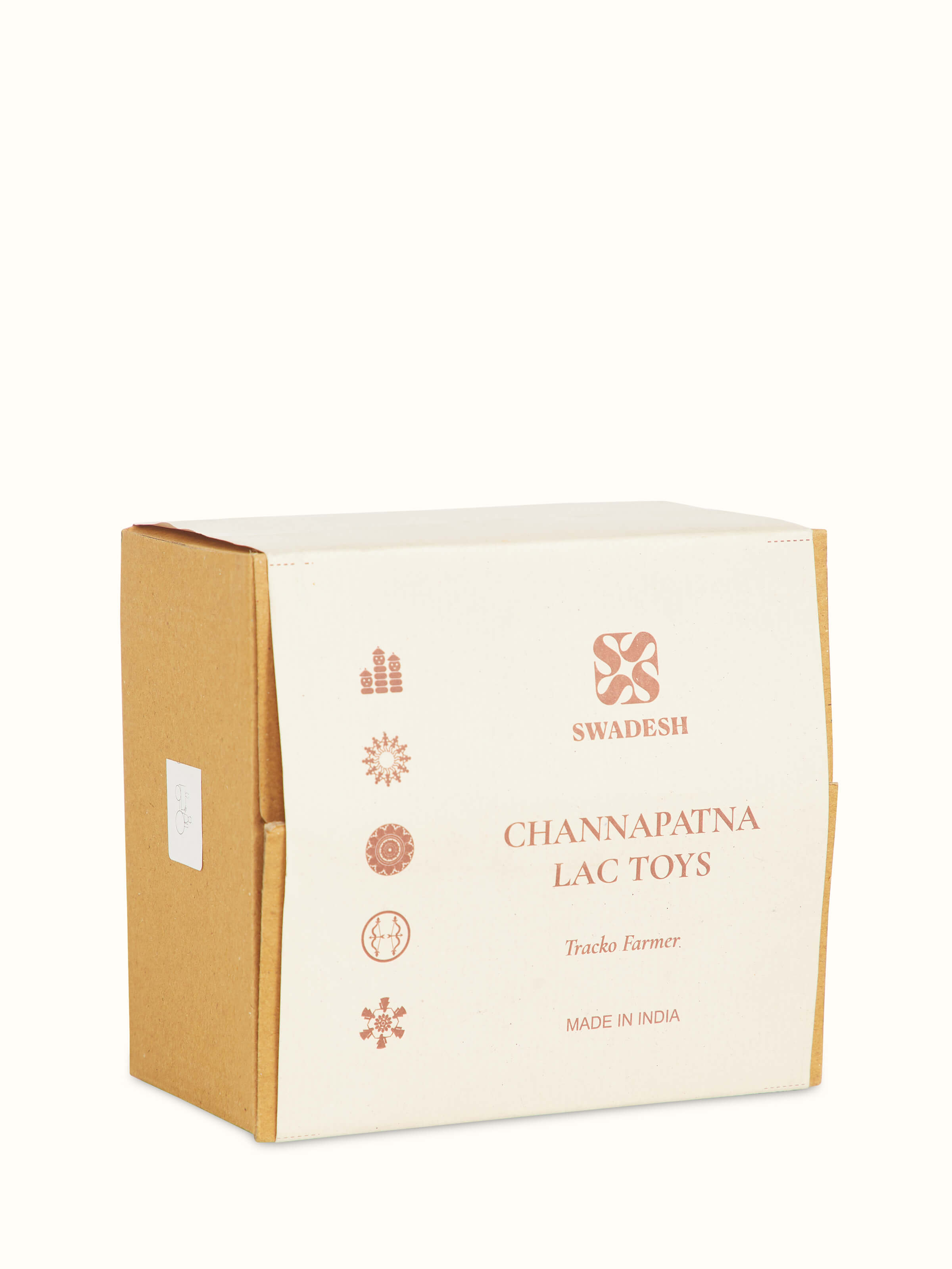 Detailed view of Channapatna ivory wood tractor toy in red color showcasing the craftsmanship and design elements