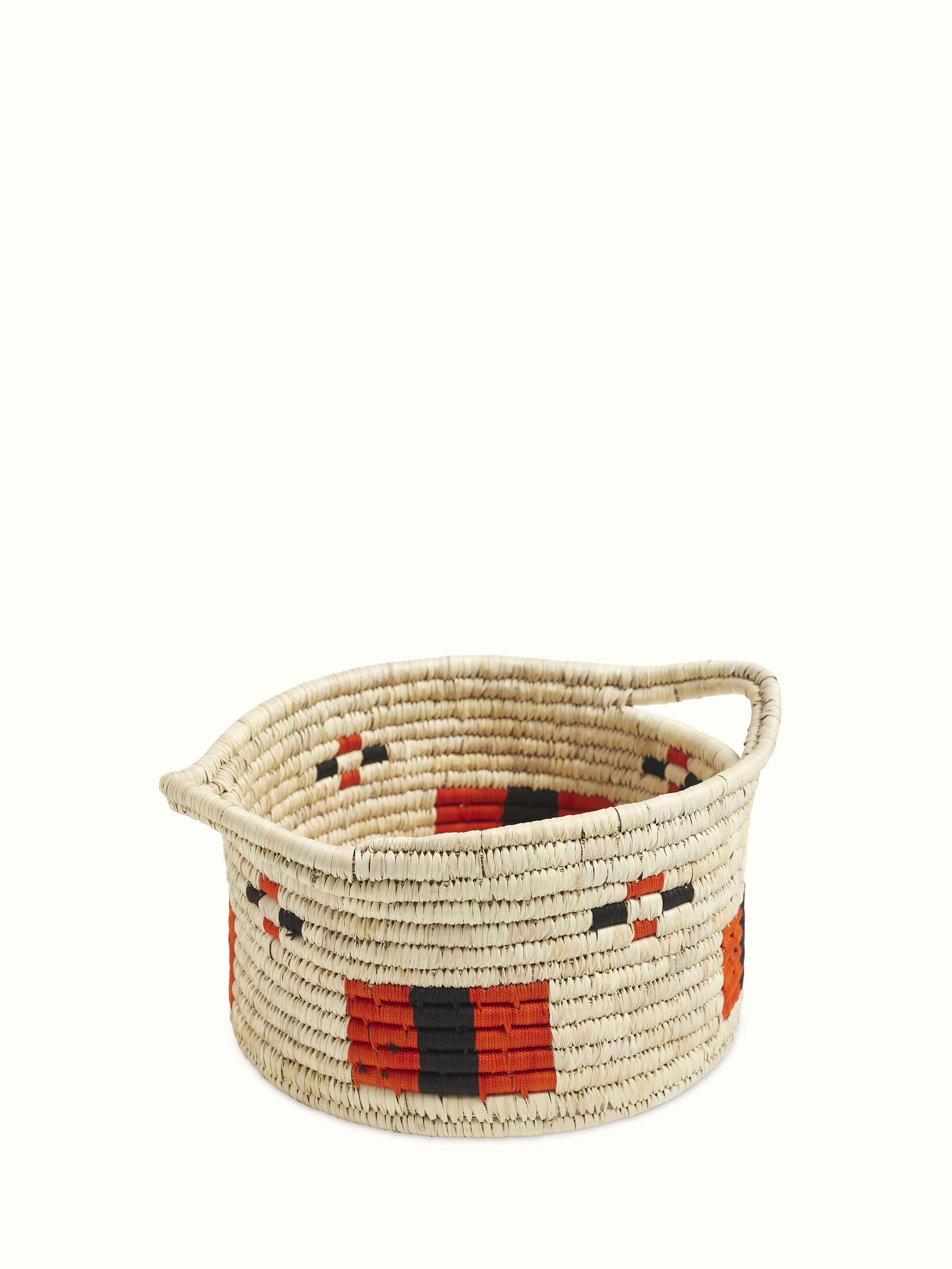 Angled view of Kanshi basketry natural fibre wine bottle holder showcasing its design