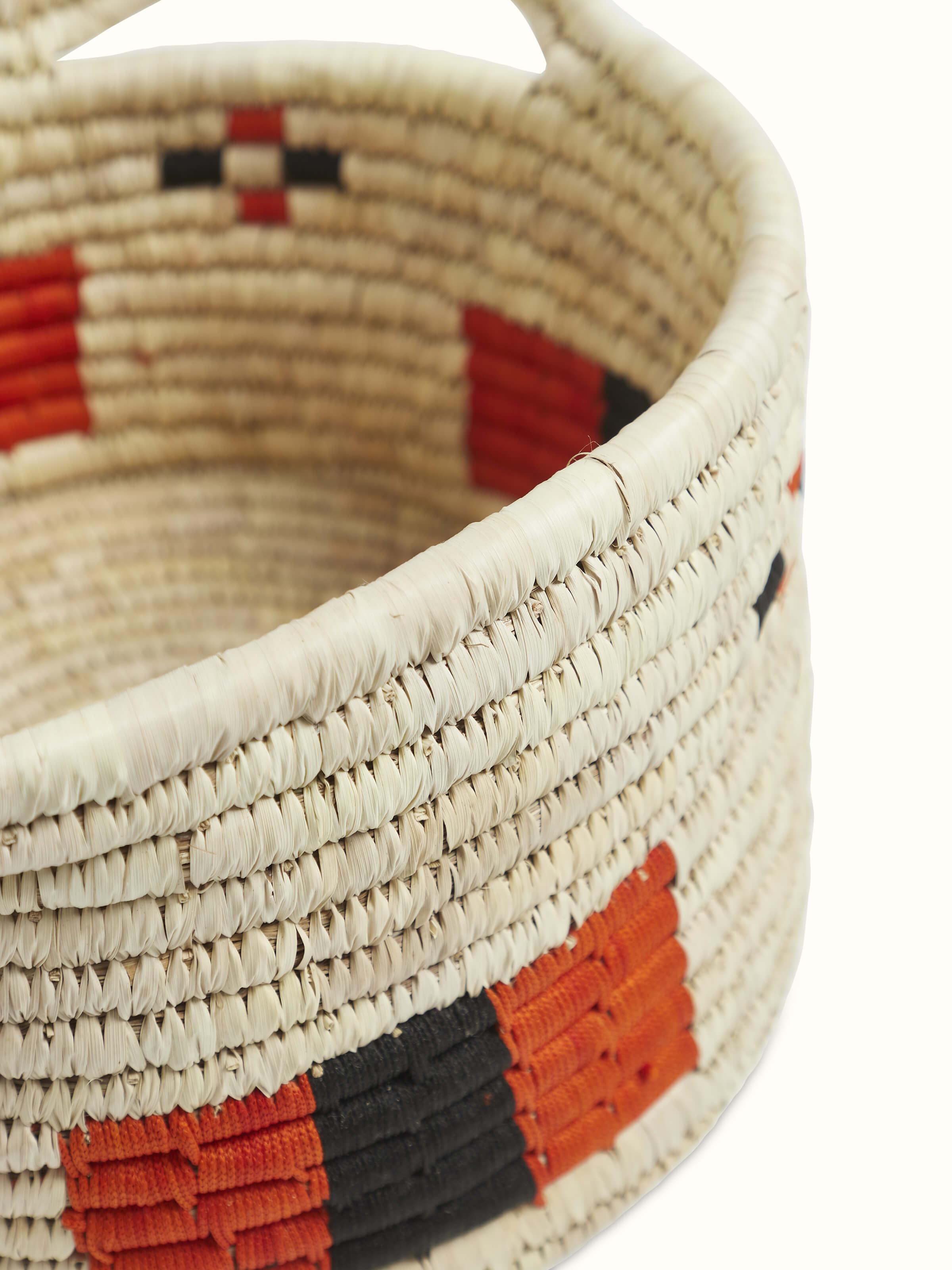 Detailed view of Kanshi basketry natural fibre wine bottle holder focusing on texture