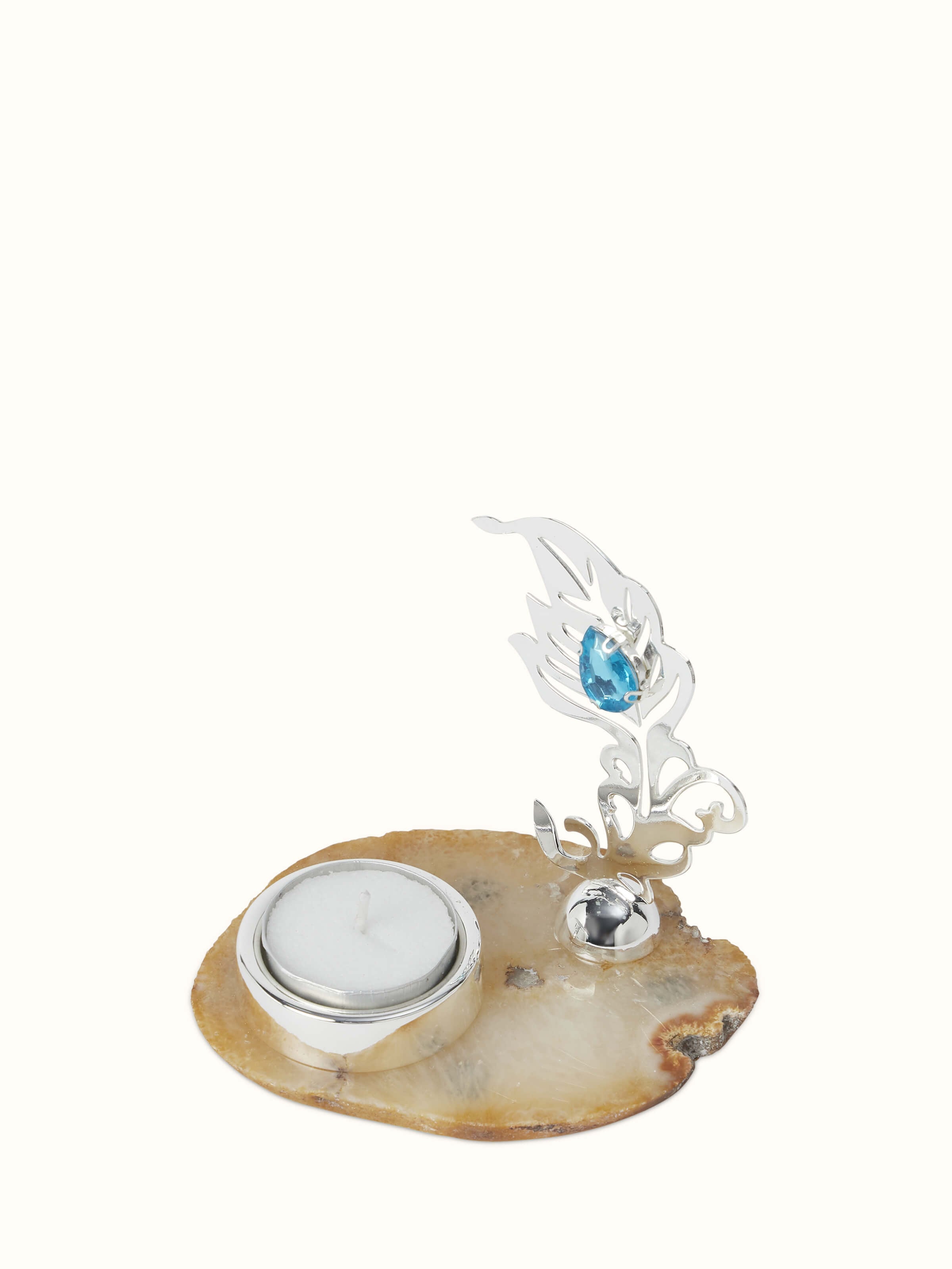 Silver-plated feather tea light holder with intricate feather design, ideal for elegant candlelit settings.