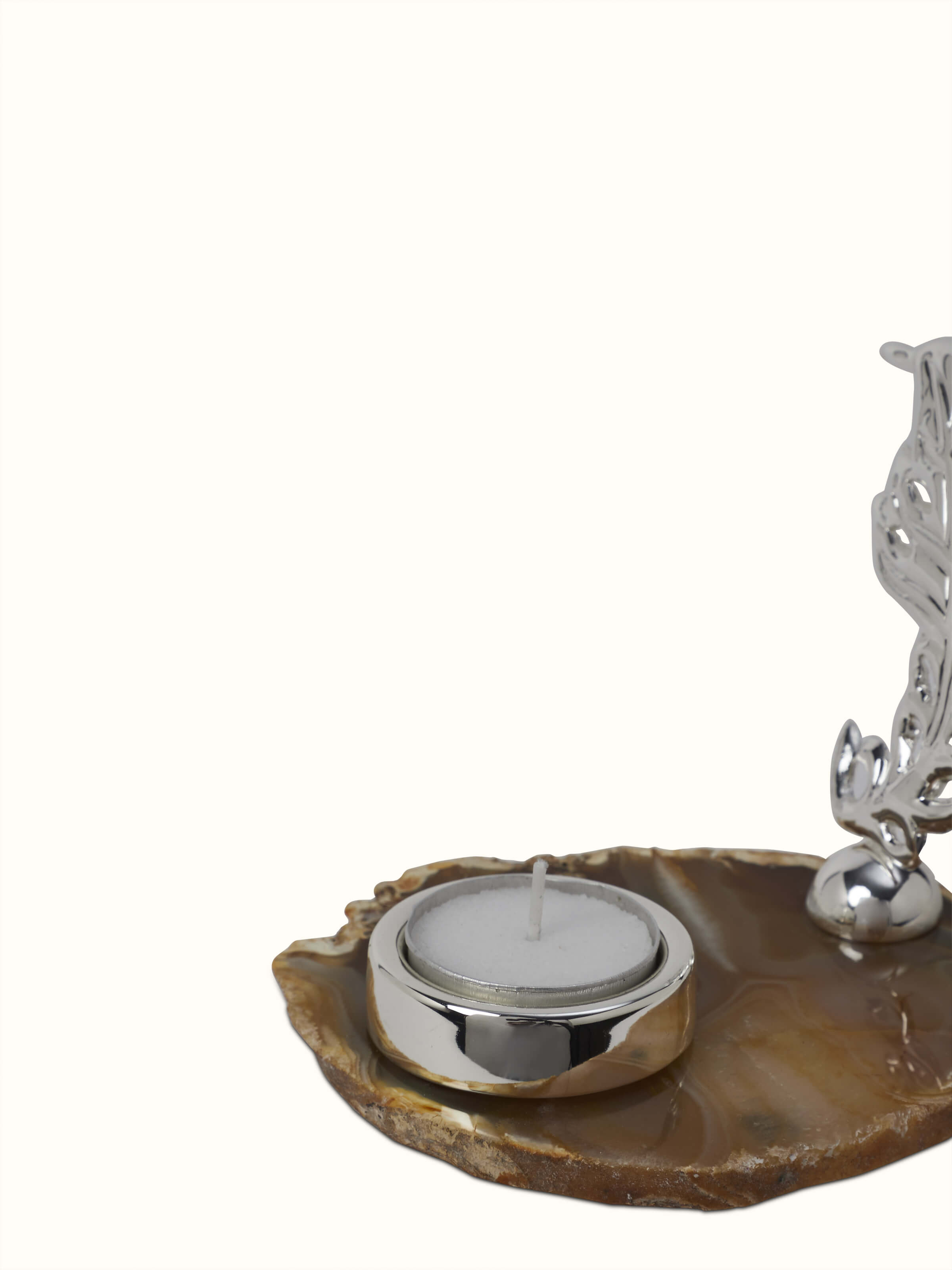 Side view of Silver-Plated Peacock Feather Tea Light Holder showing intricate details