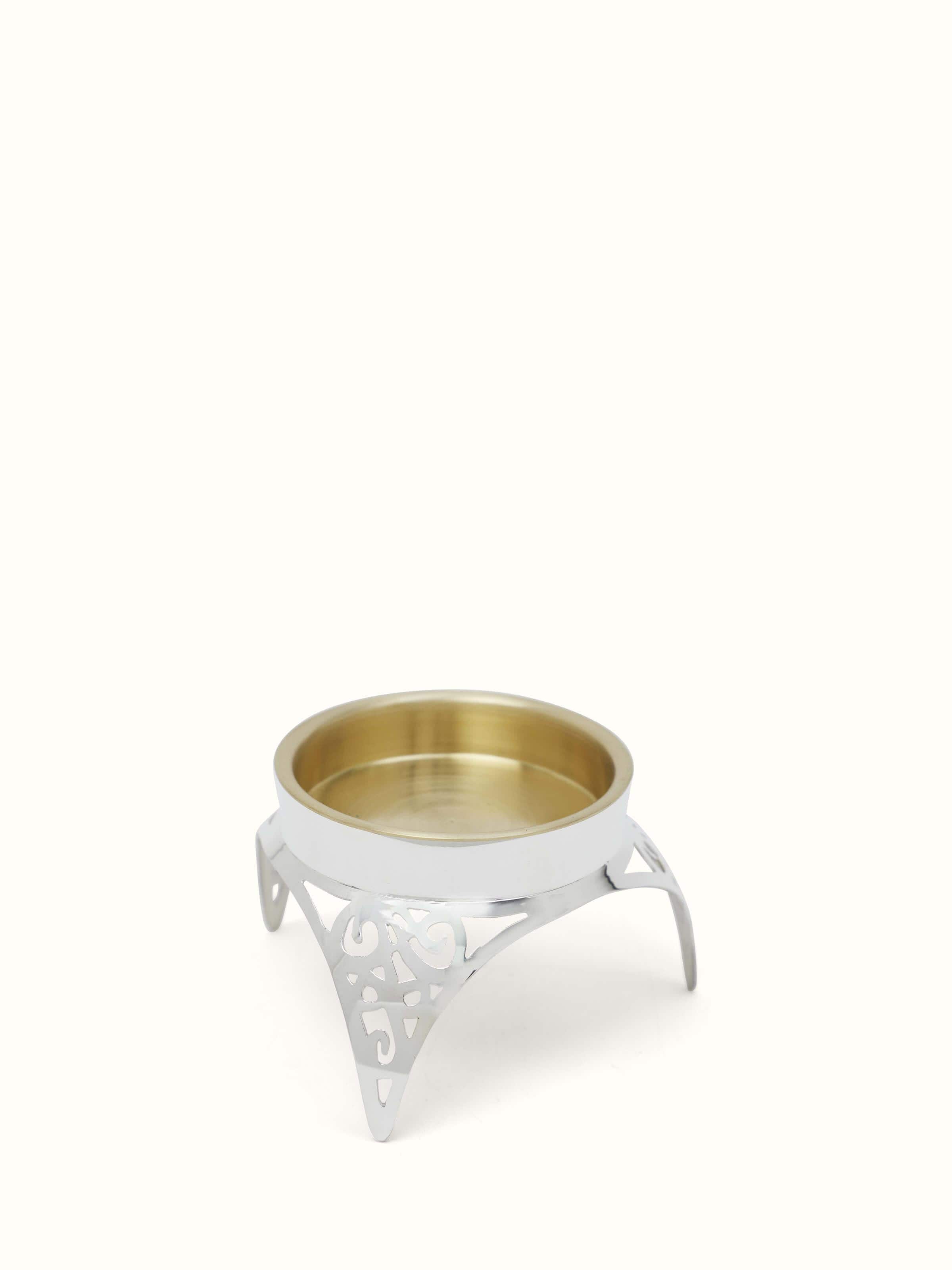 Side view of Silver & onyx diya highlighting its intricate silverwork and onyx details