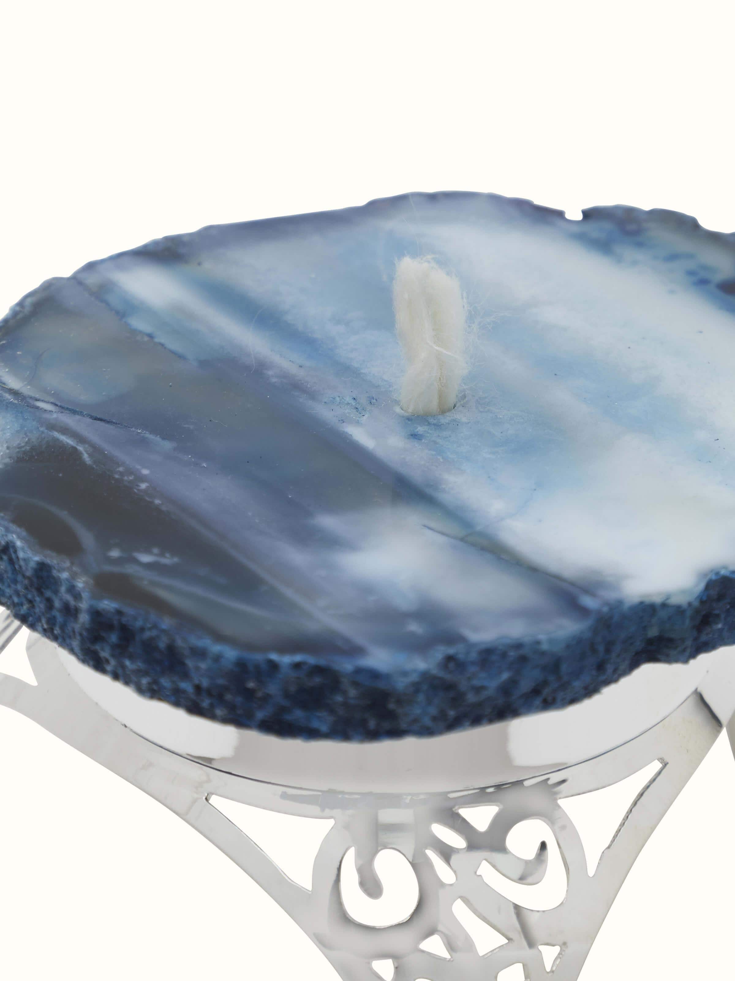 Angled view of Silver & onyx diya showcasing its elegant shape and refined design