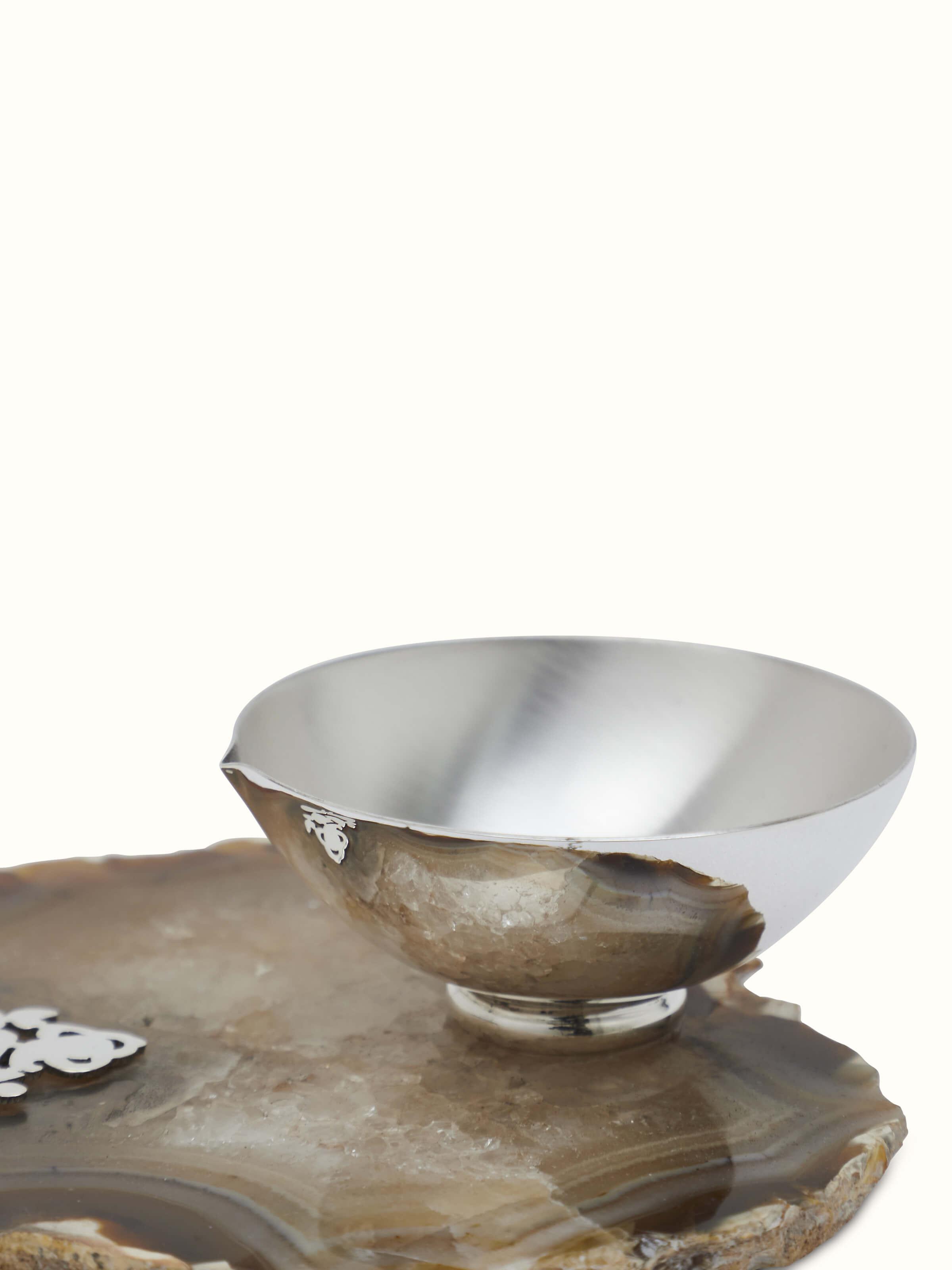 Close-up view of Silver Ganesh diya highlighting the intricate details and silverwork