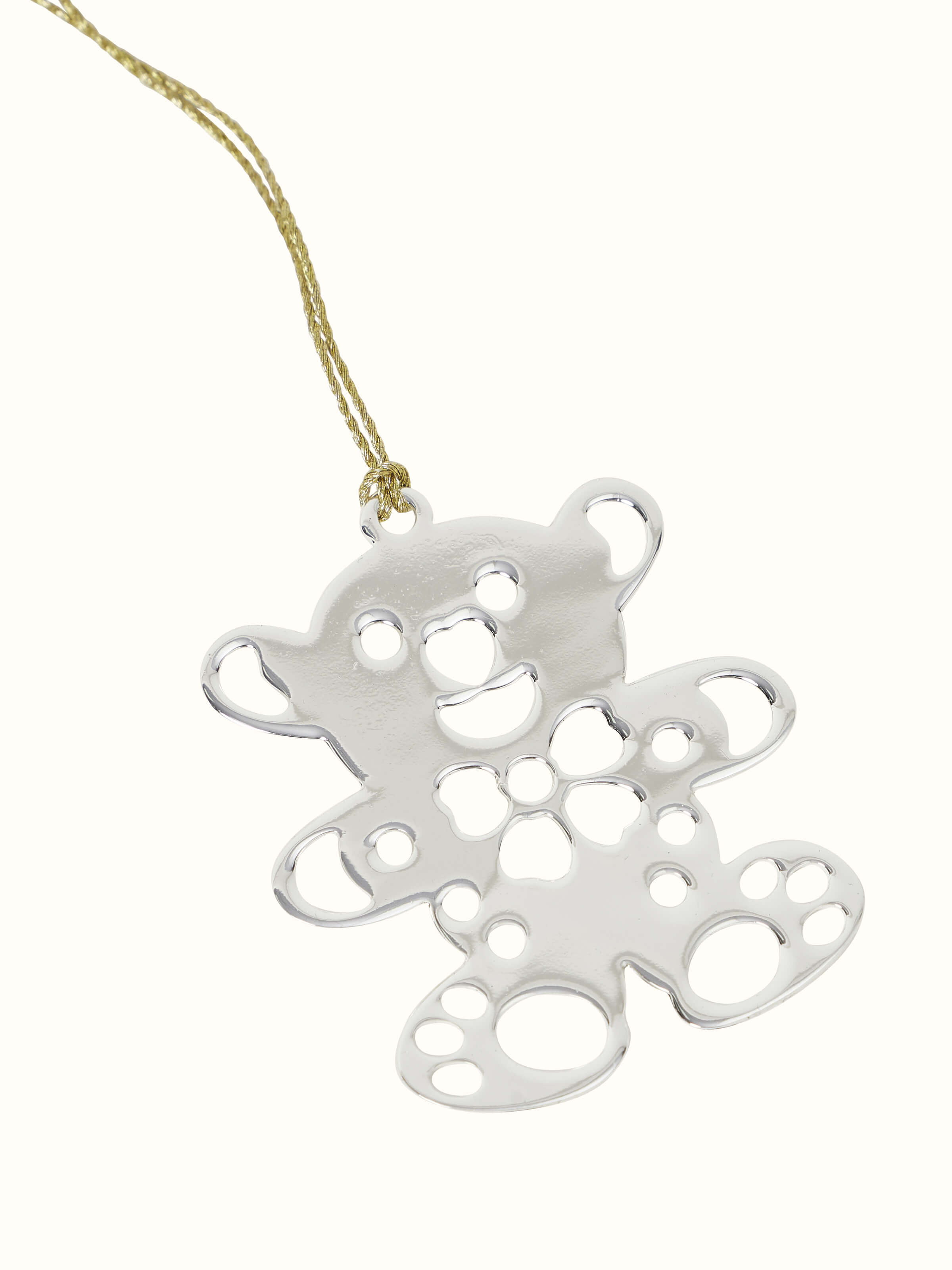 Side view of silver-plated teddy bookmark showing the detailed craftsmanship and sleek finish