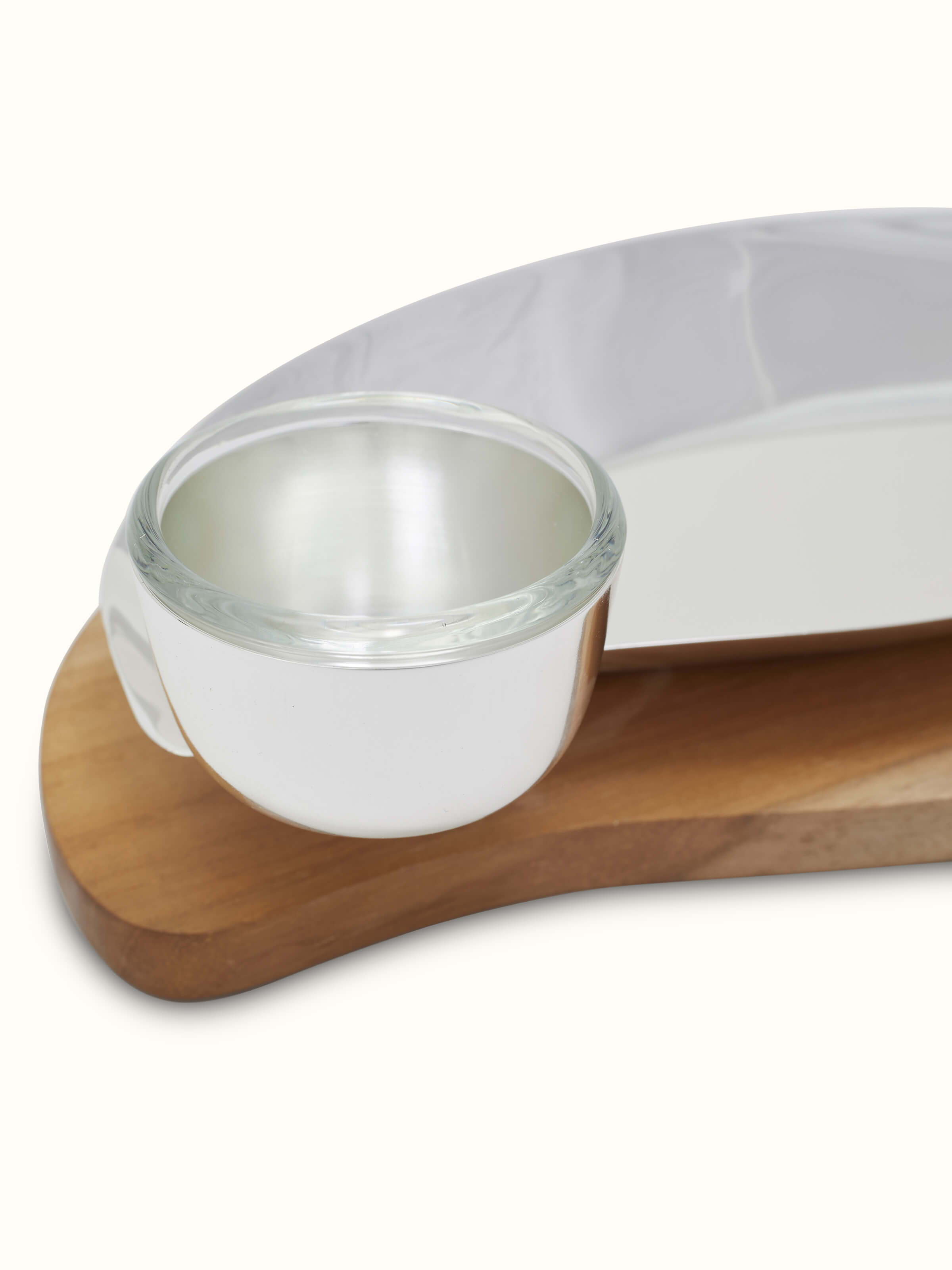 Silver-plated rectangular nut bowl in a setting, demonstrating its practical use and aesthetic appeal.