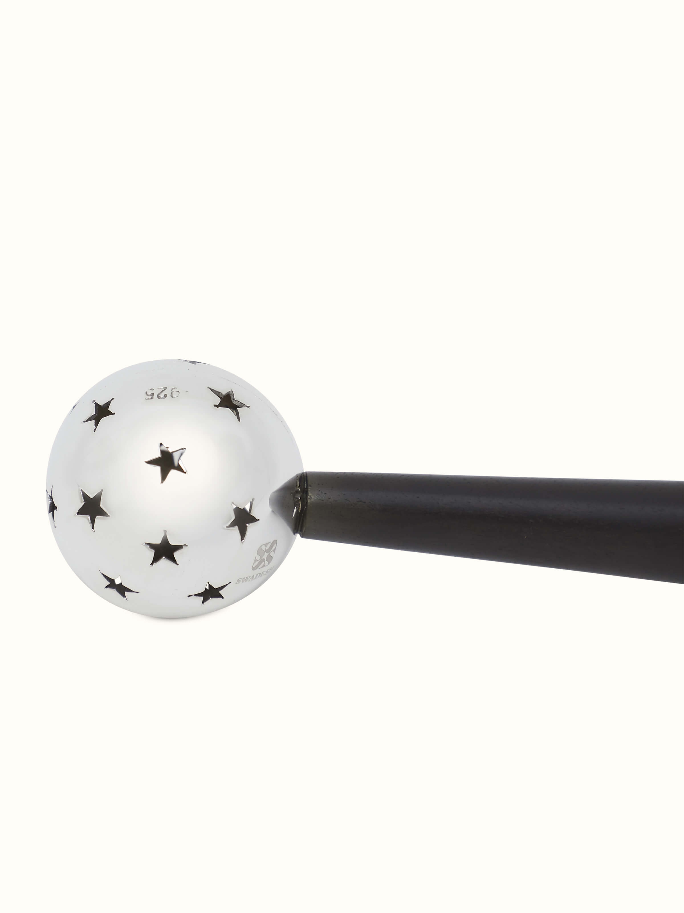 Side view of Silver star rattle toy highlighting the textured surface
