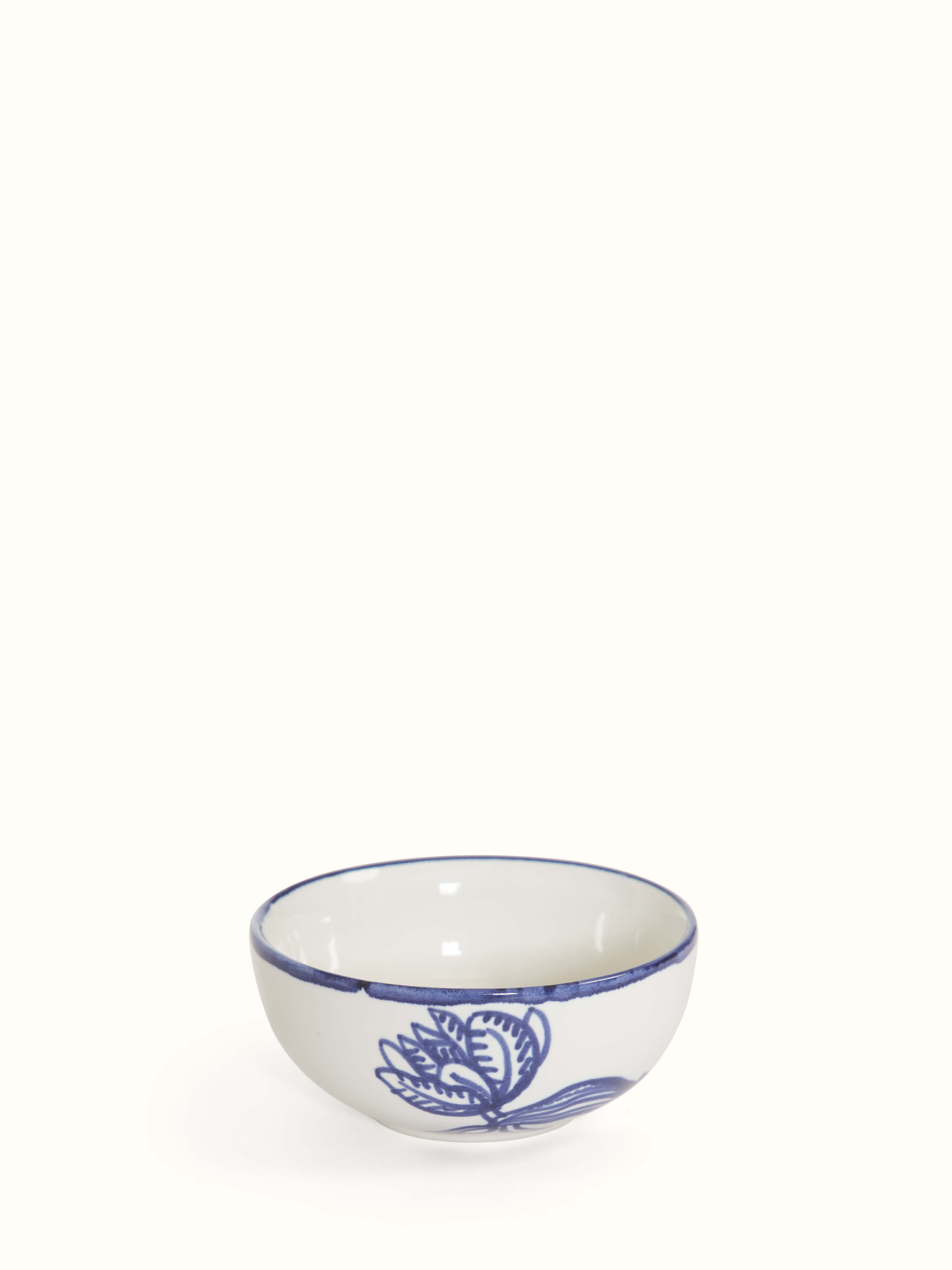 Angled view of Studio Pottery Ceramic Dinner Bowls in Indigo & White (4 pcs) displaying patterns.