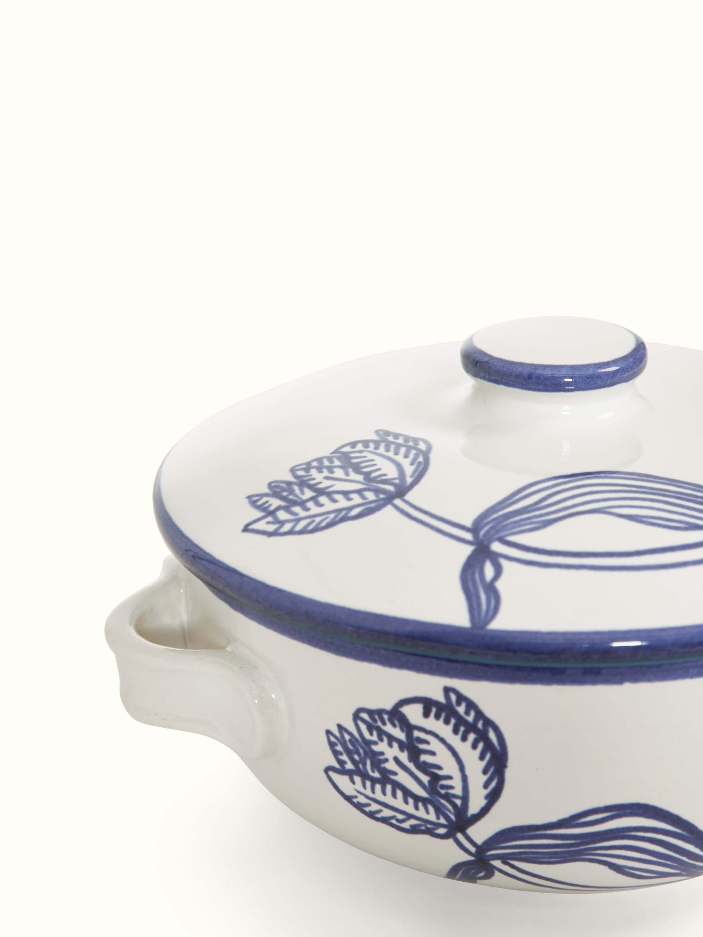 Side view showing the Khurja Pottery Ceramic Roti Box with its lid on, highlighting the overall shape and details