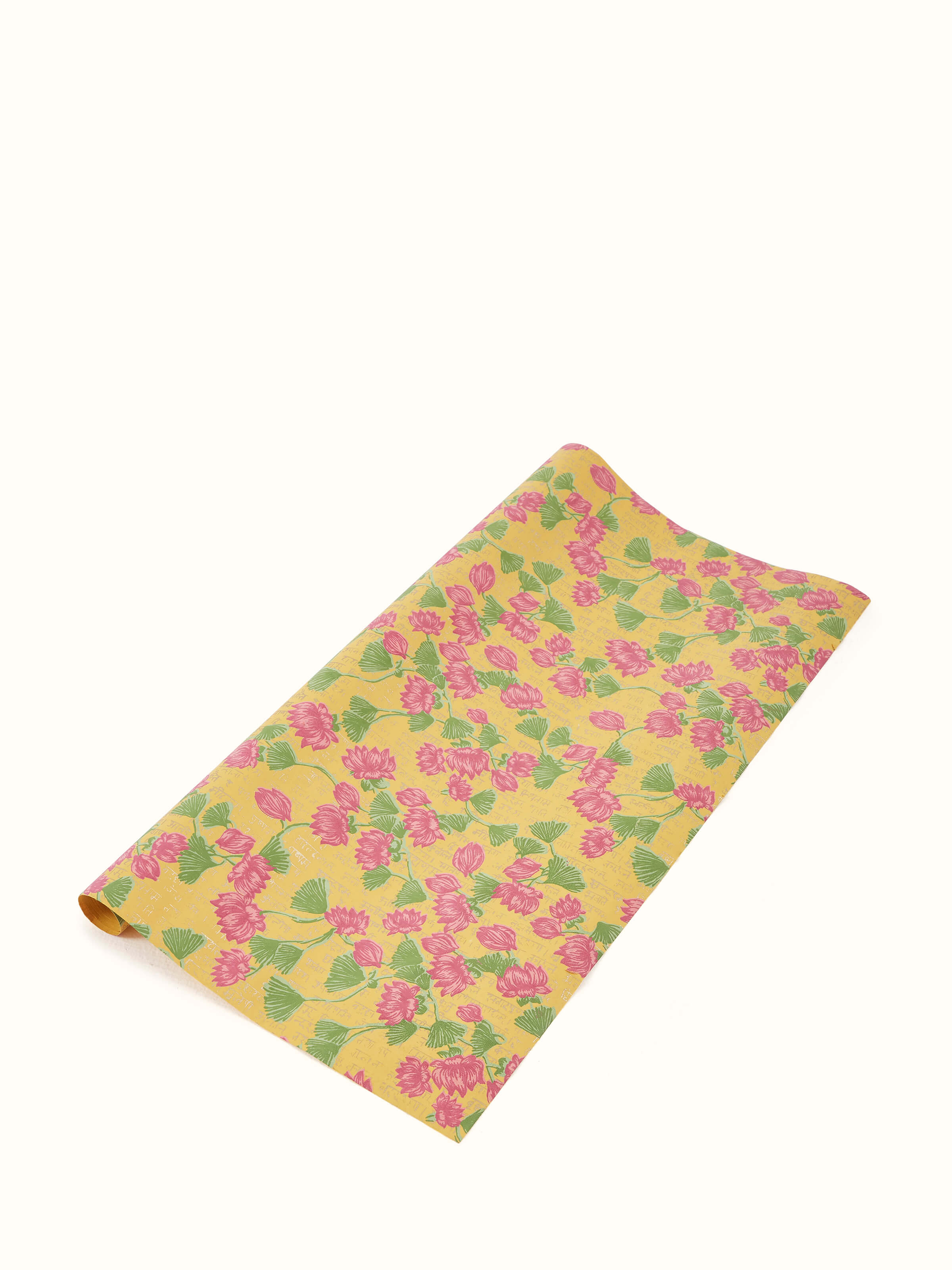 Detailed view of blue handmade paper wrapping sheets, featuring a textured surface and elegant color.