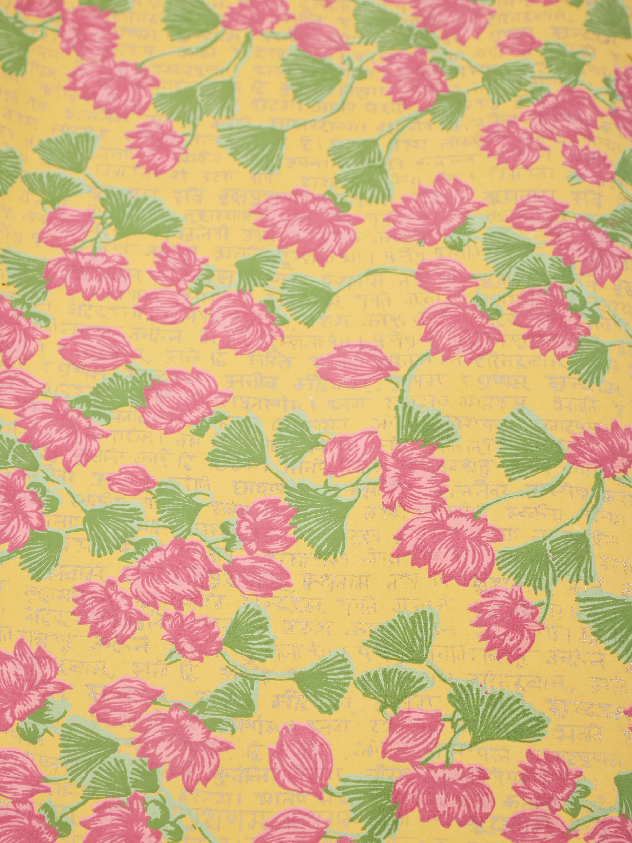 Top view of blue handmade paper wrapping sheets, highlighting their size and detailed design.