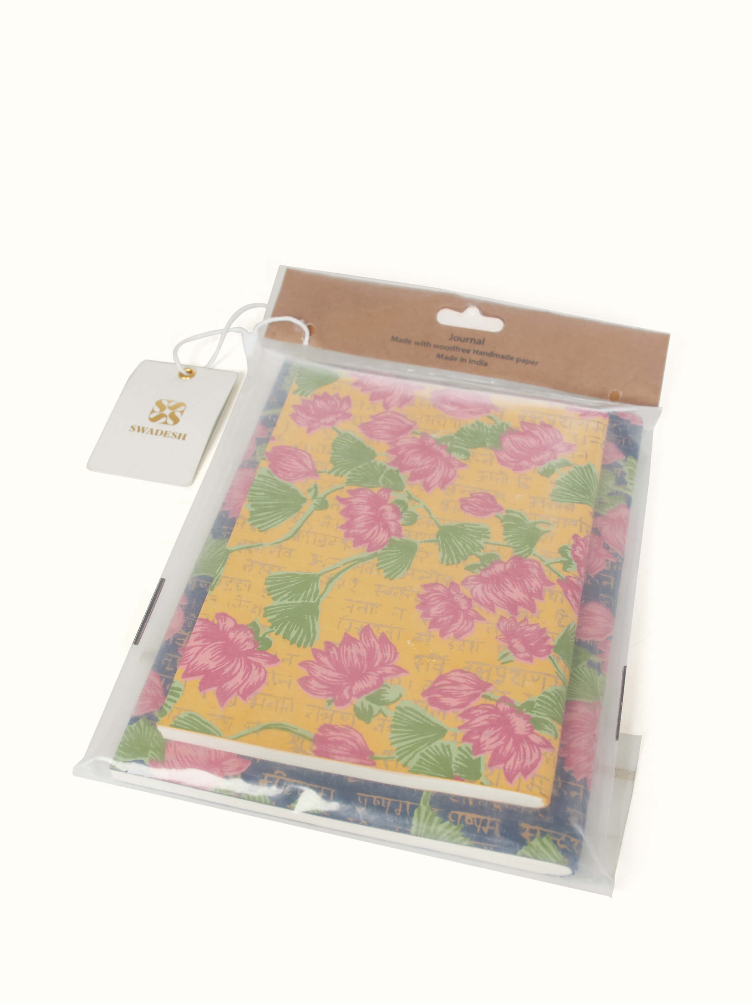 Close-up of Handmade Paper Softbound Notebooks in yellow (2 pcs), highlighting the texture and quality of the paper