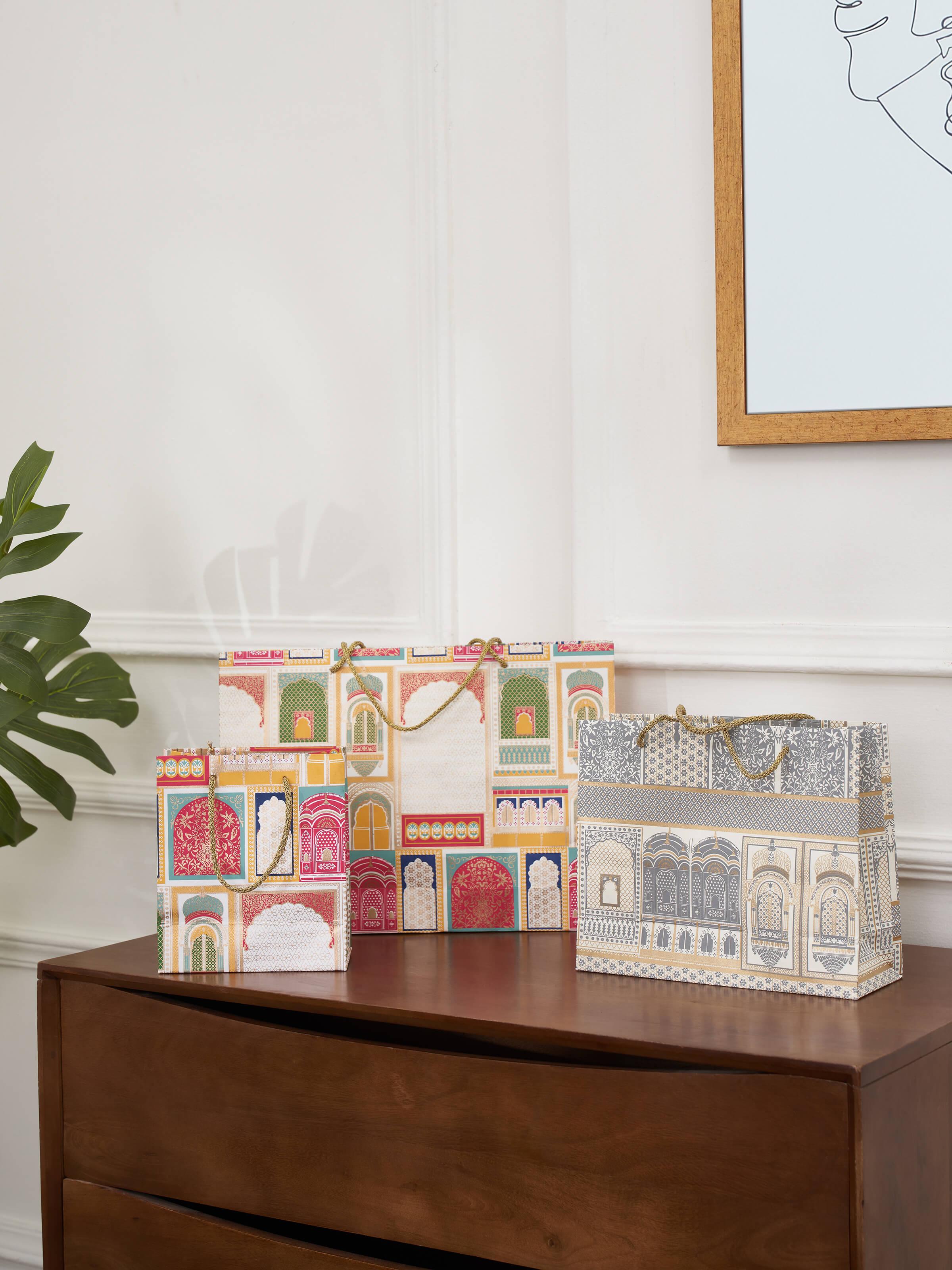 Side view of Handmade paper gift bags white (3 pcs) emphasizing their minimalist design.