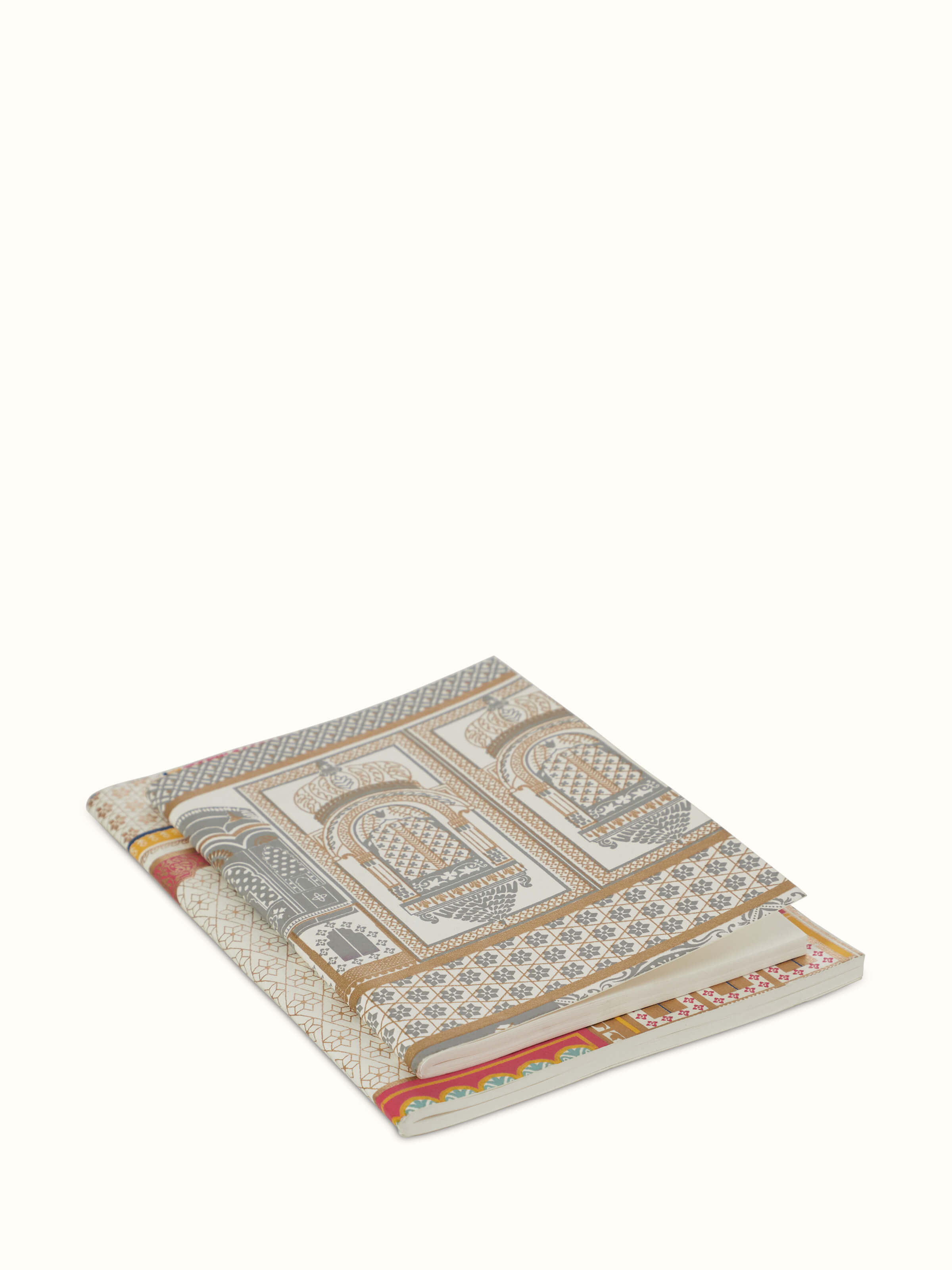 Detailed view of handmade paper soft bound notebooks in white, emphasizing the texture and paper quality