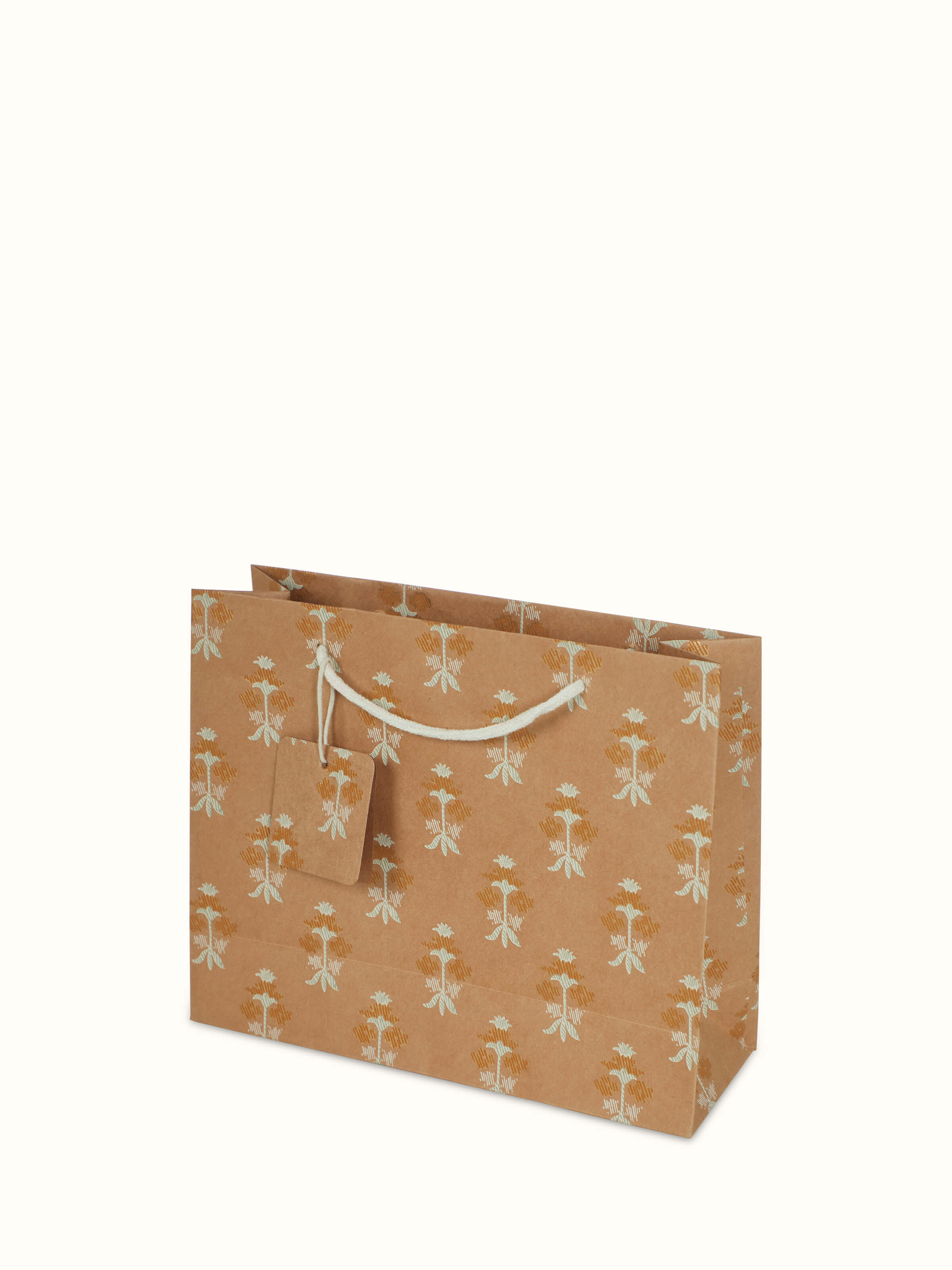 Artistic view of handmade paper gift bags in white (3 pcs), showcasing the design and texture.