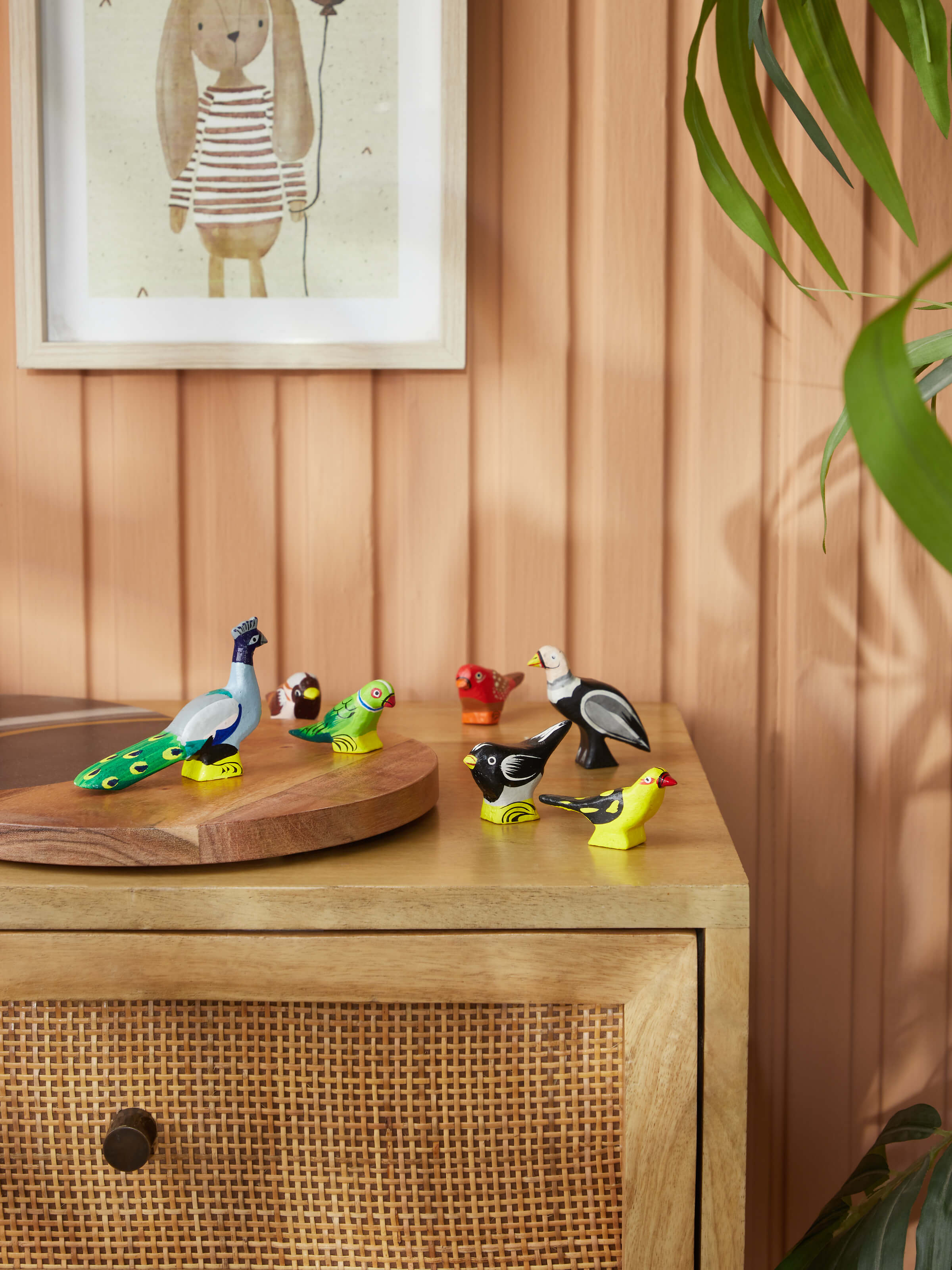 Side view of wooden endangered Indian bird toys (6 pcs) highlighting individual bird carvings.