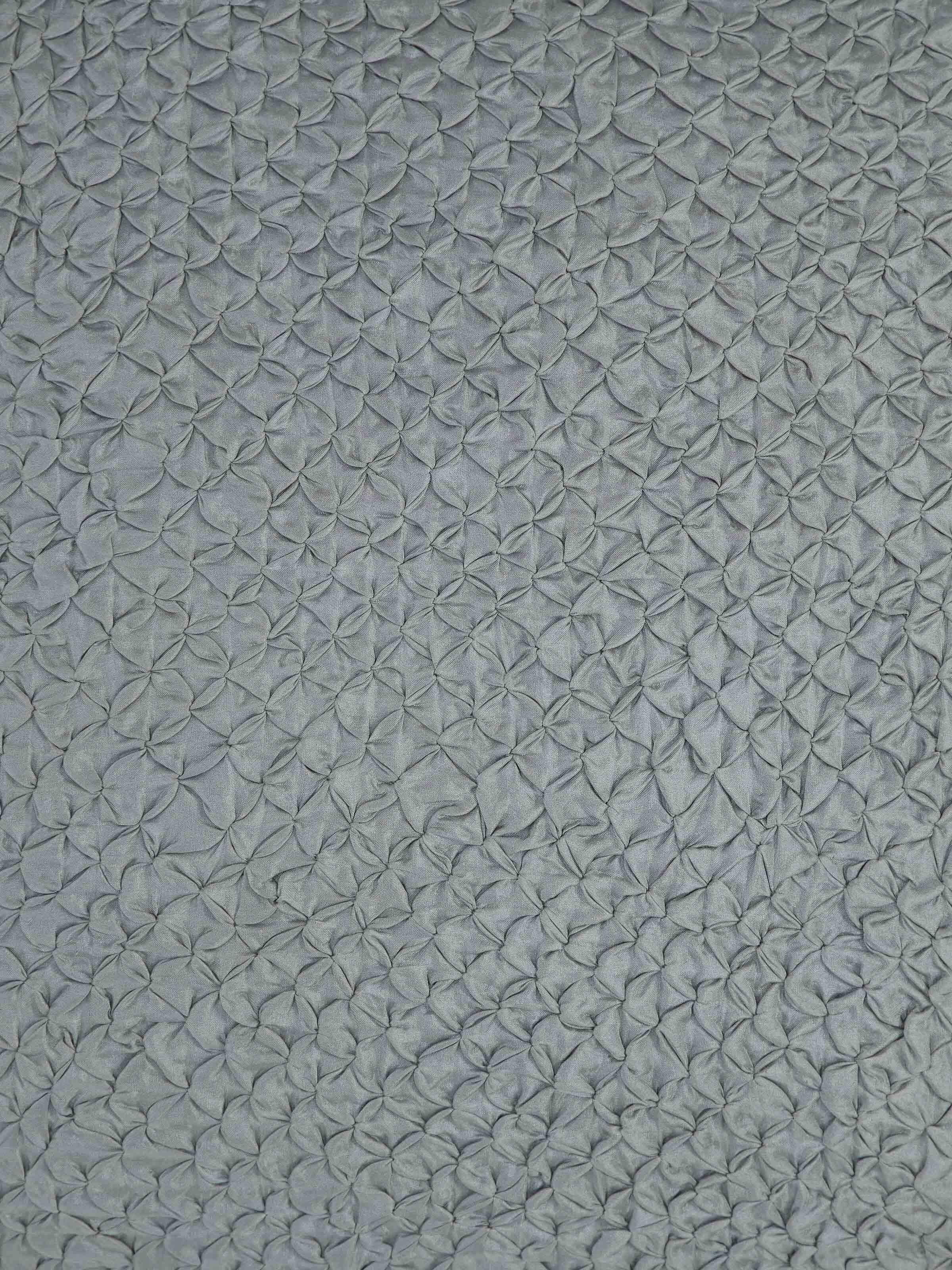 Detailed view of Svarupa Grey Textured Silk Bandhani Tie and Dye Cushion Cover, focusing on the fabric texture and design.