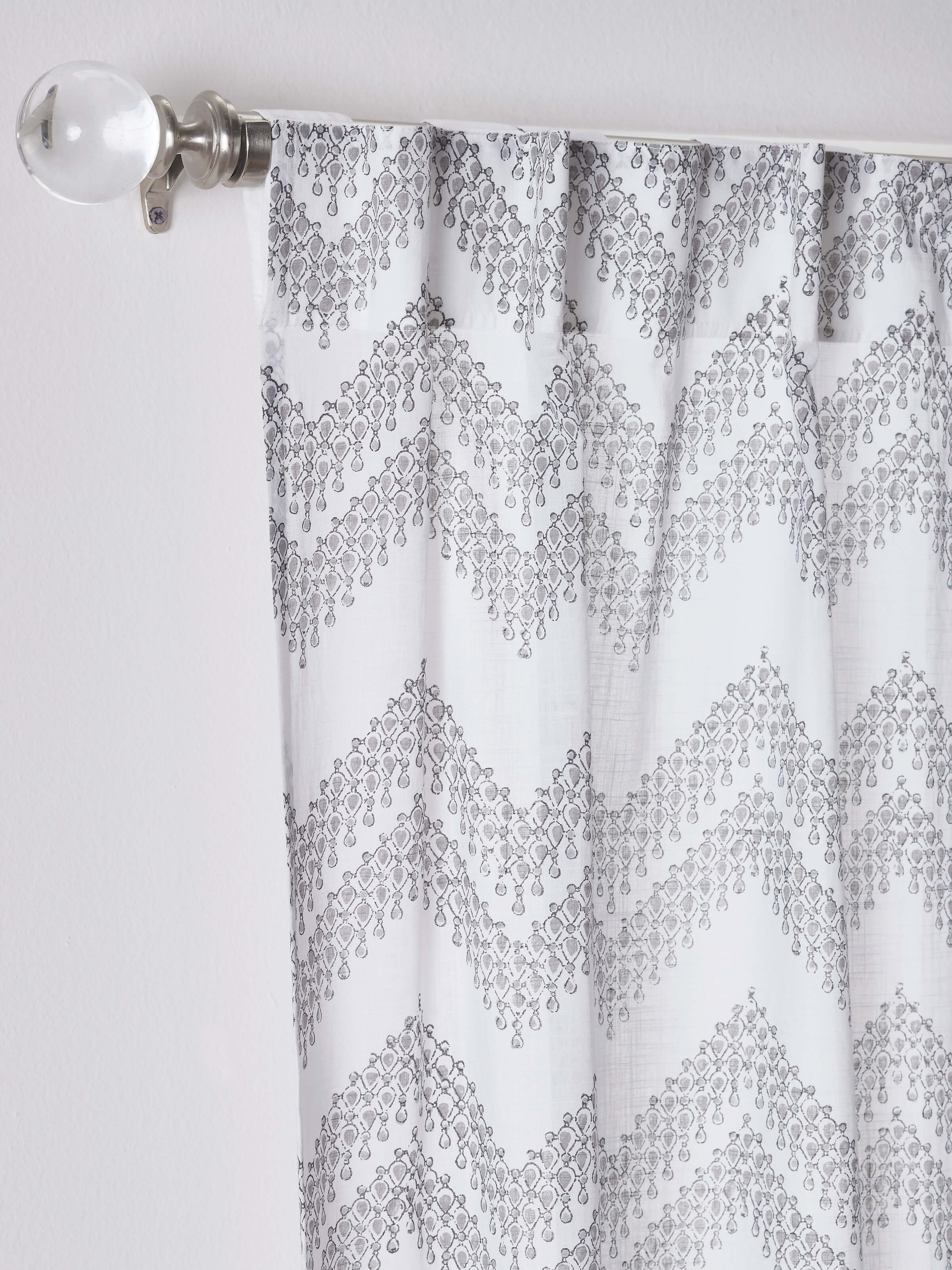 Full view of Rambagh white modern geo chevron cotton Sanganeri block printed curtain (7 ft), featuring a geometric chevron pattern in a crisp white color.