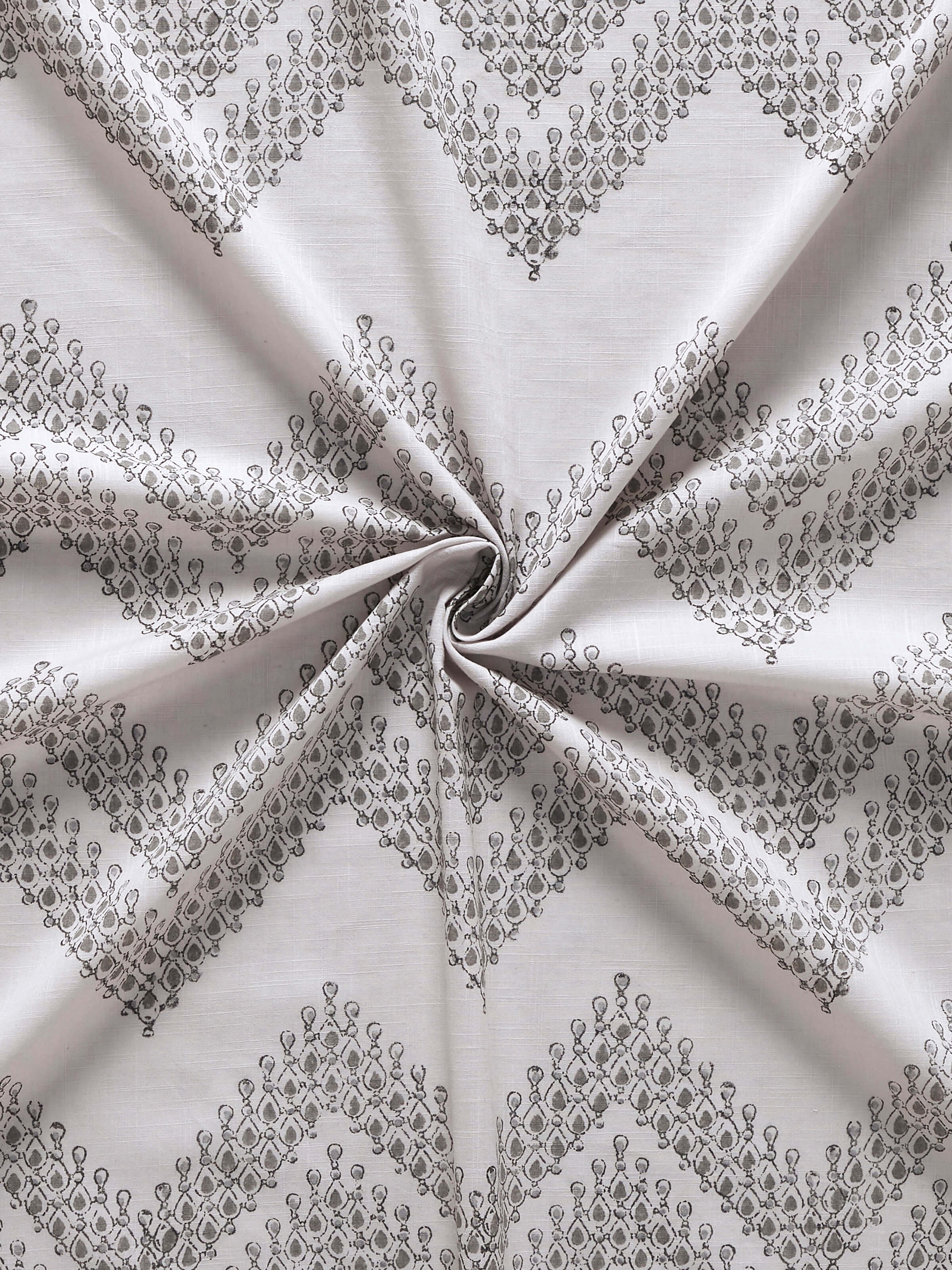 Detailed view of Rambagh Light Grey Modern Geo Chevron Cotton Sanganeri Block Printed Curtain (9 ft), highlighting the chevron pattern and color tones.