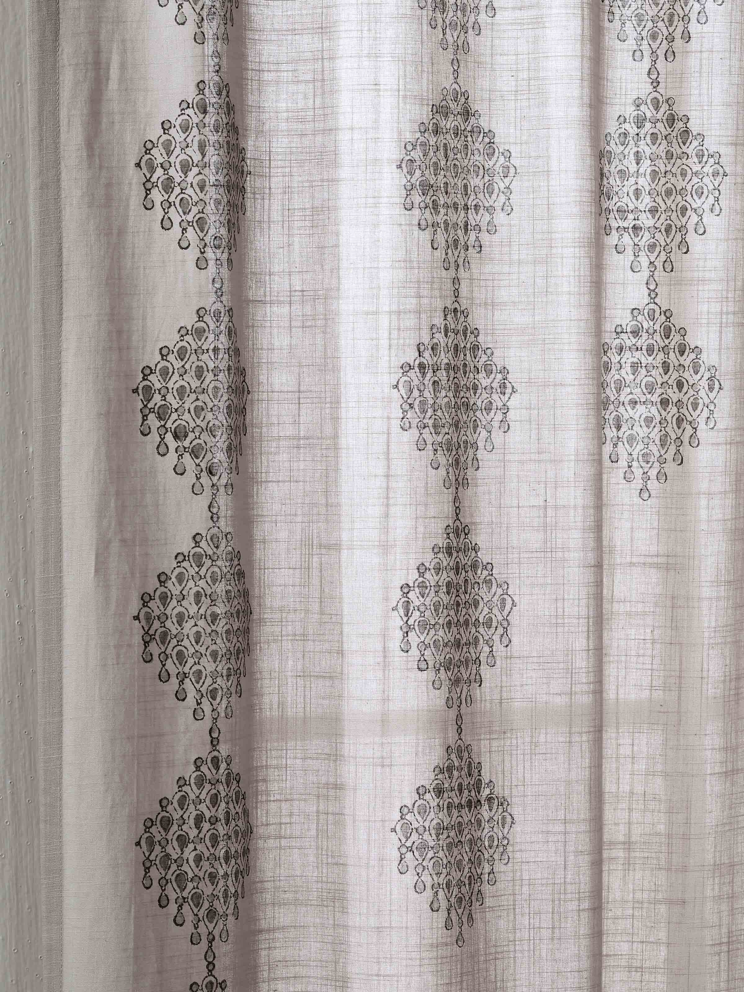 Flat lay of Rambagh Light Grey Modern Geo Diamond Cotton Sanganeri Block Printed Curtain (9 ft) showing the full length and pattern of the curtain