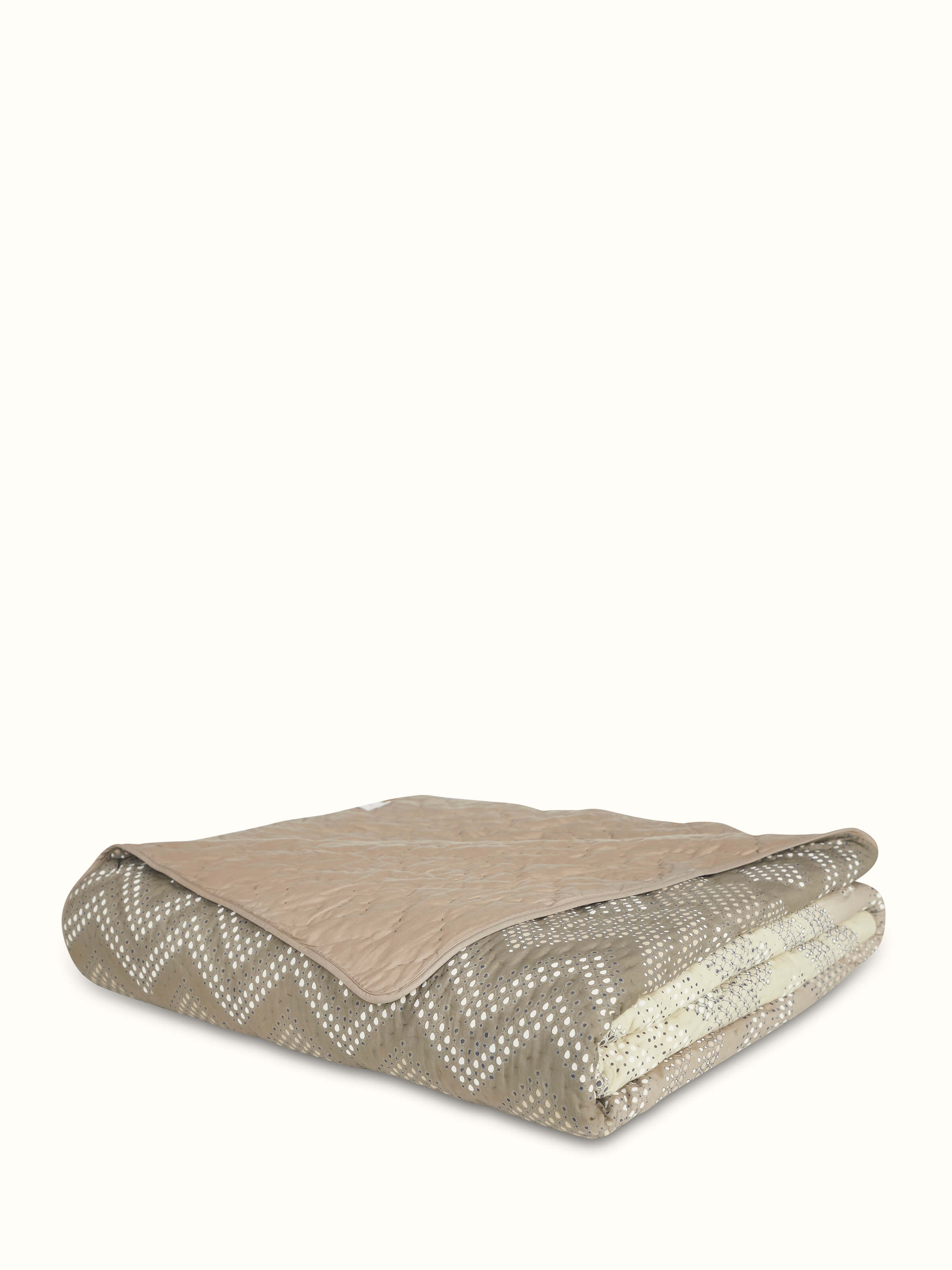 Detailed view of Rambagh green ombre geo cotton Sanganeri block printed double quilt showing the print details and texture.