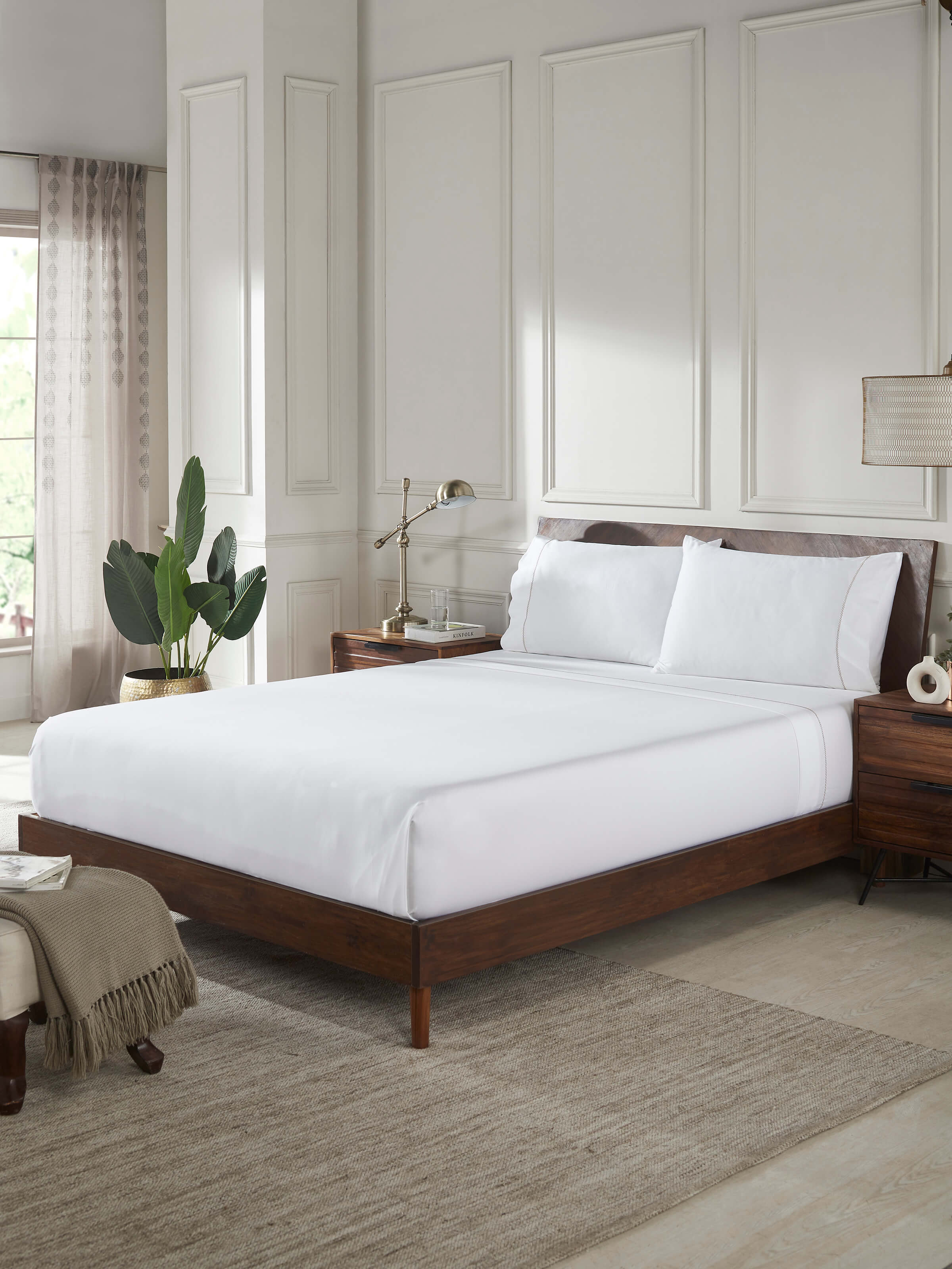 Side view of Rambagh green stripe cotton hand embroidered bedsheet king set (3 pcs) emphasizing the embroidery details