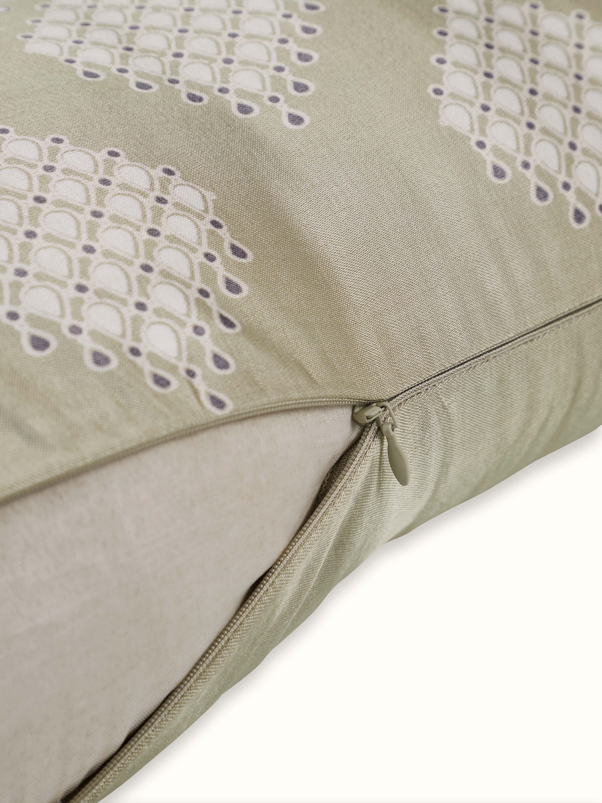 Detailed view of Rambagh green modern geo viscose cotton Sanganeri block printed cushion cover highlighting the intricate geometric pattern.