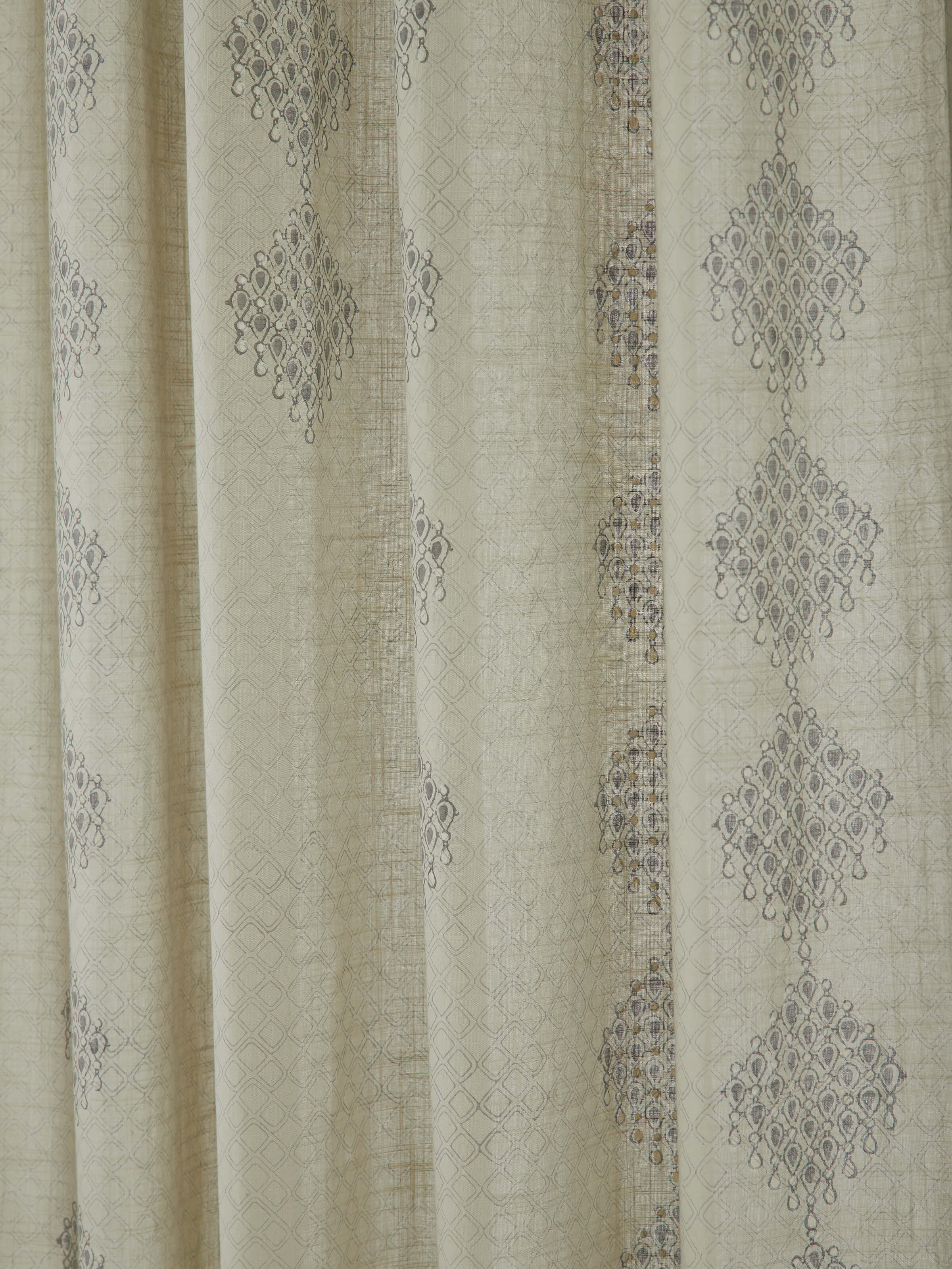 Detailed view of Rambagh light green modern geo diamond cotton Sanganeri block printed curtain (7 ft) focusing on the curtain’s fabric and print quality