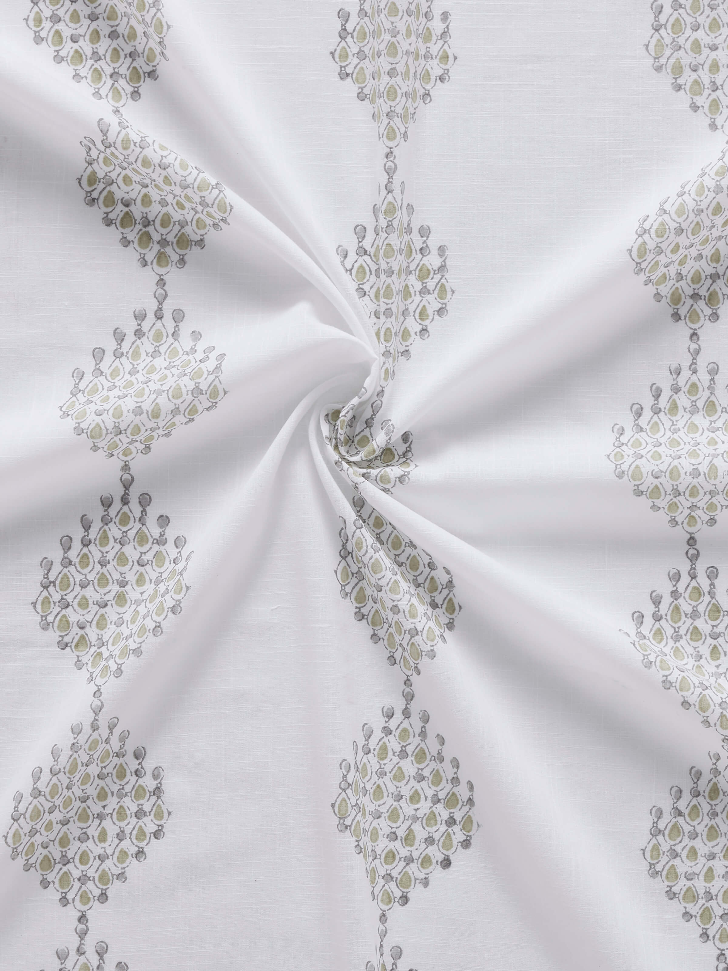 Rambagh white and green curtain displaying the modern geo pattern in natural light