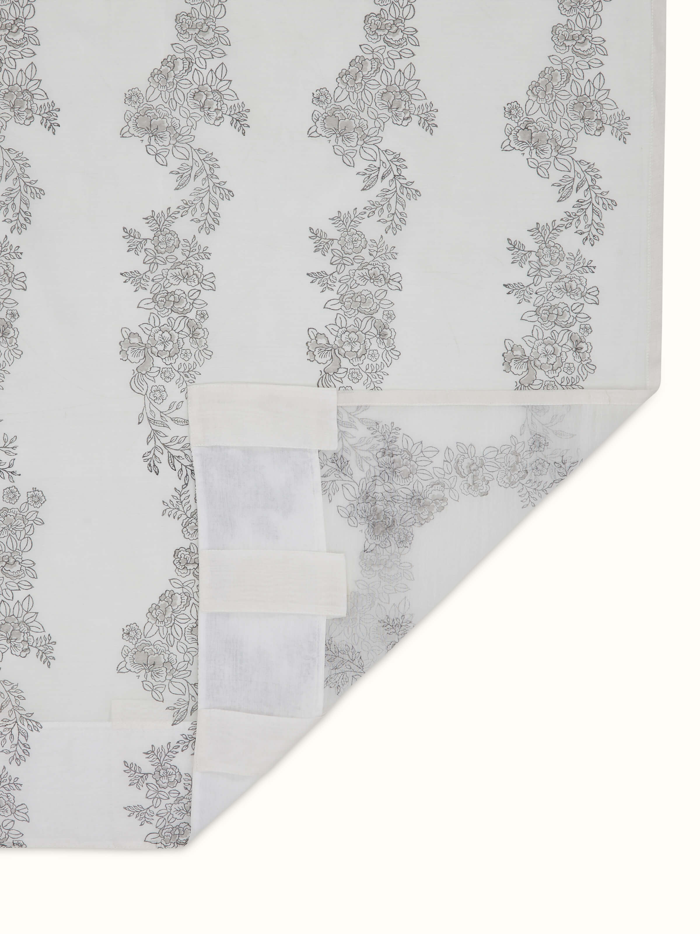 Close-up view of Shivranjini white floral stripe cotton silk Sanganeri block printed curtain (9 ft) showing the fine details of the block print and stripes.