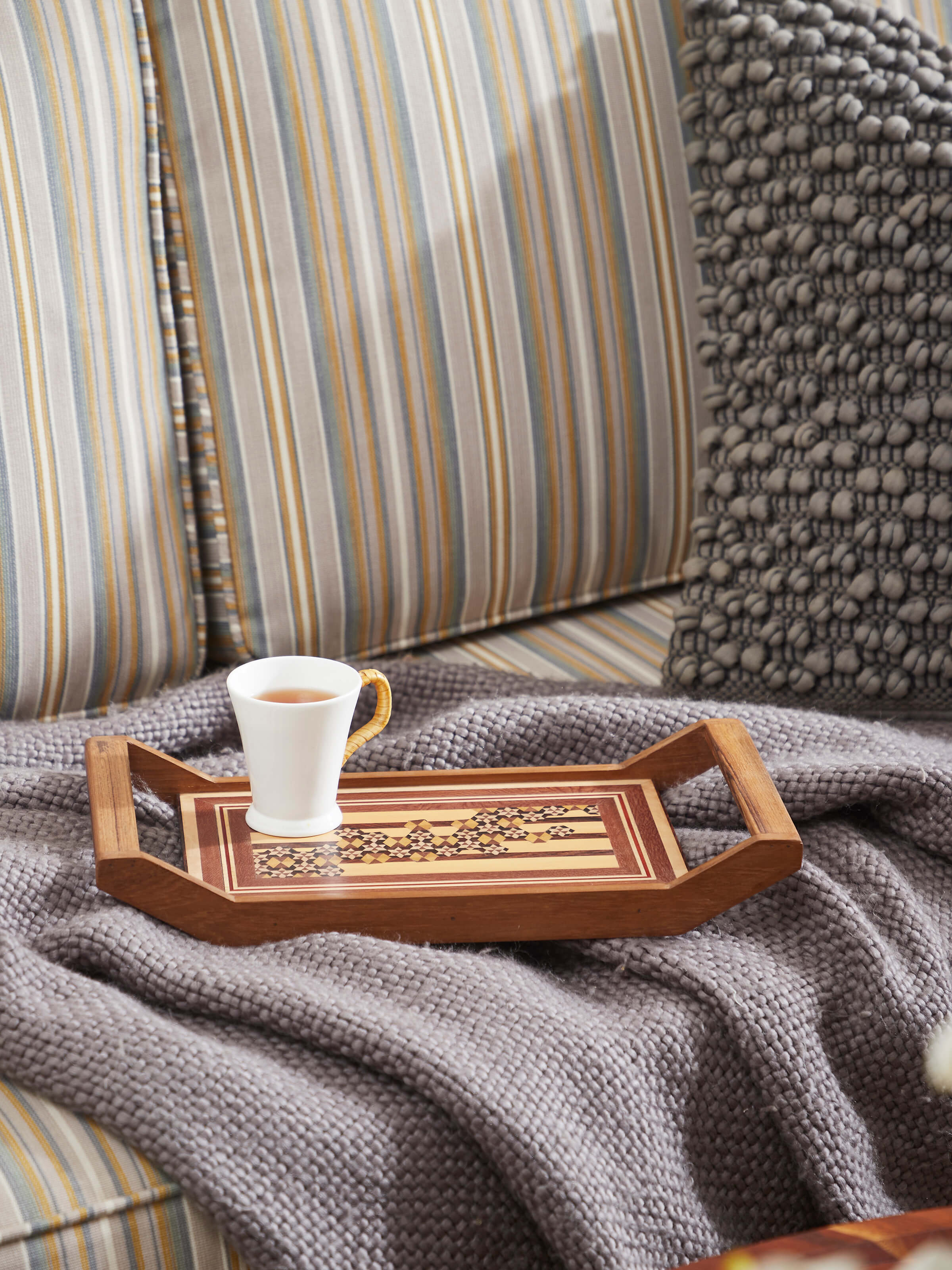 Side view of Marquetry wood & MDF serving tray in honey color highlighting elegant craftsmanship