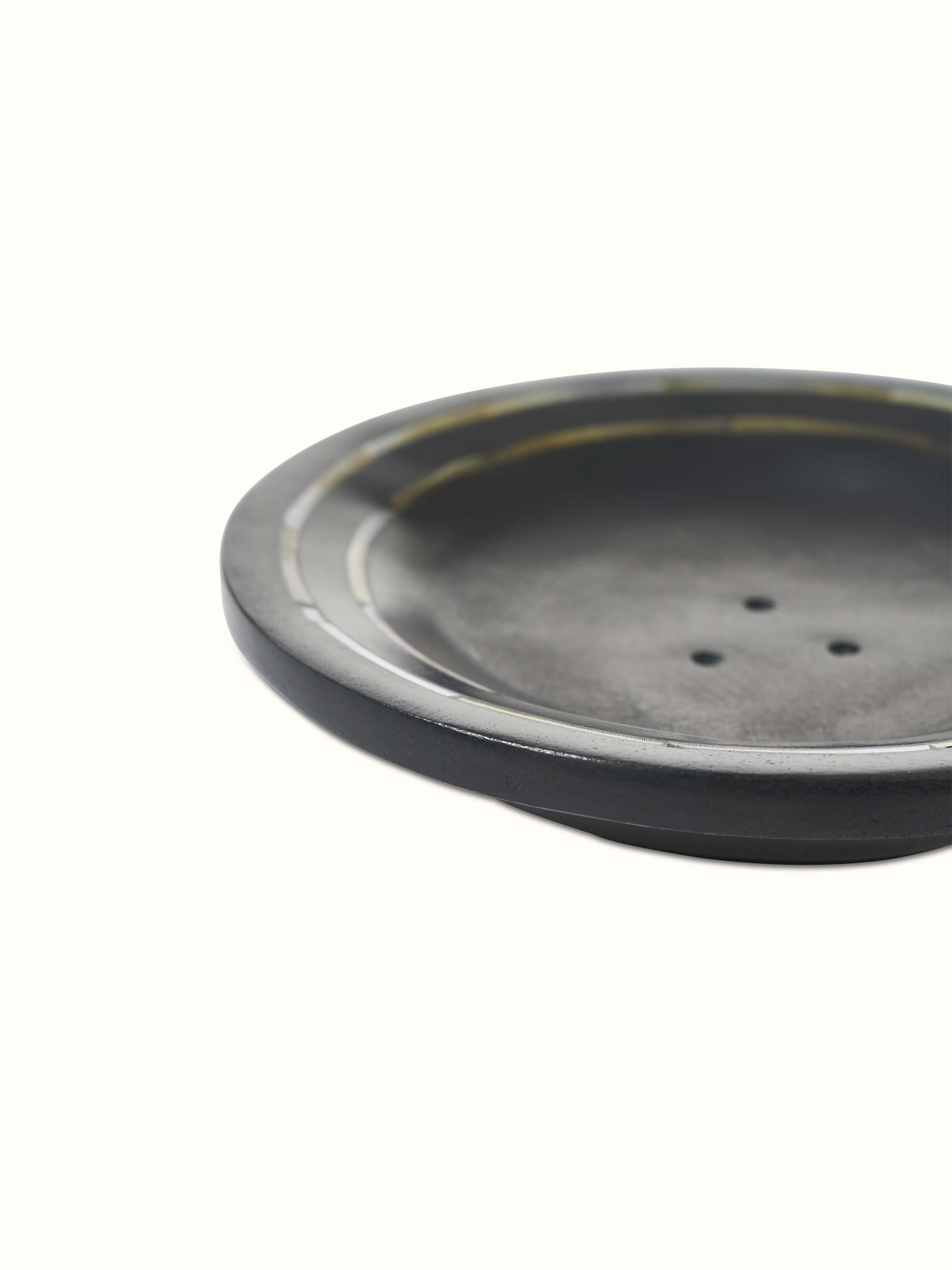 Close-up of Carved Marble Stone Soap Dish in Black Color showing the finish and texture