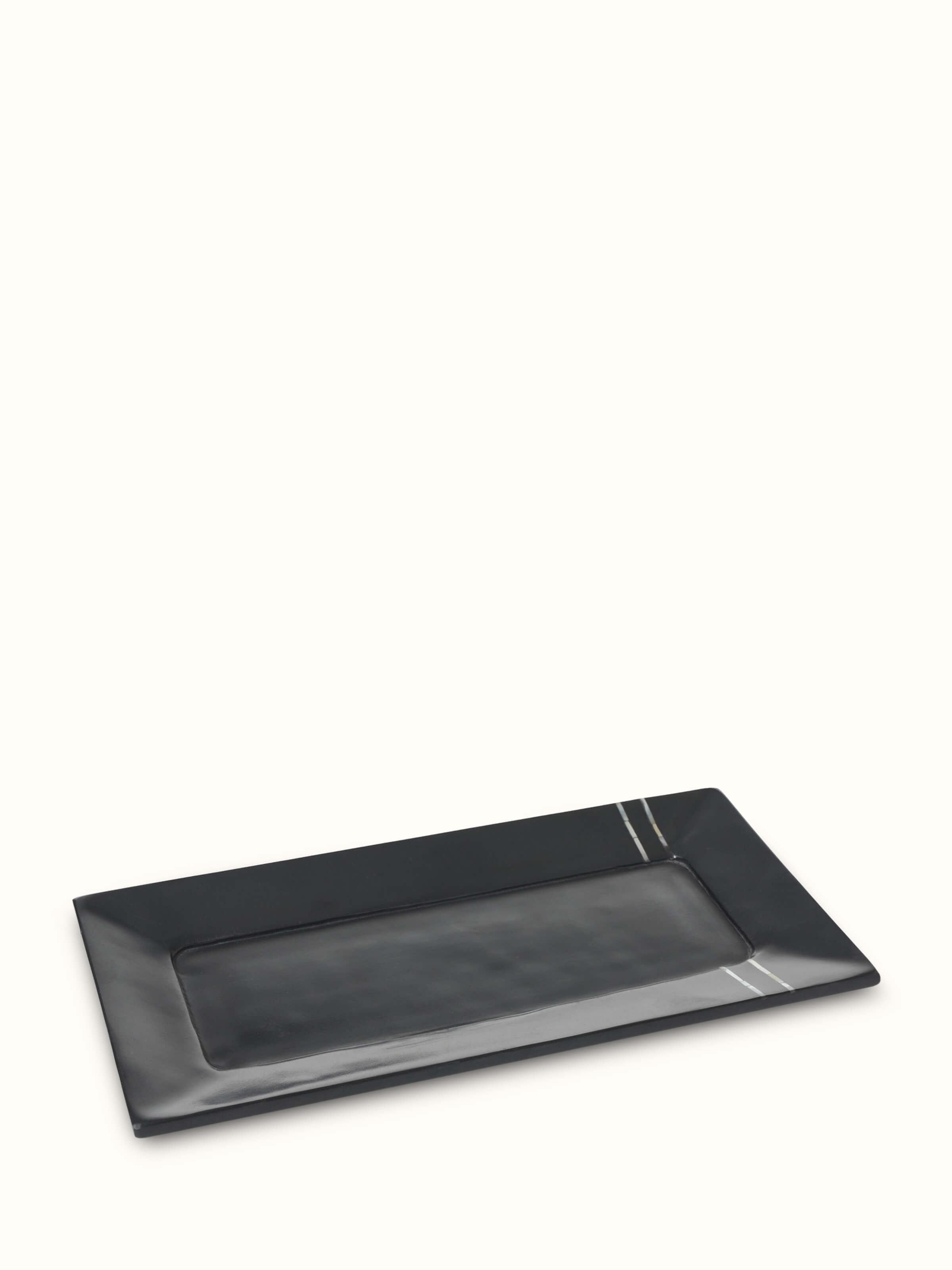 Close-up of Carved marble stone bath tray in black color focusing on the high-quality marble finish