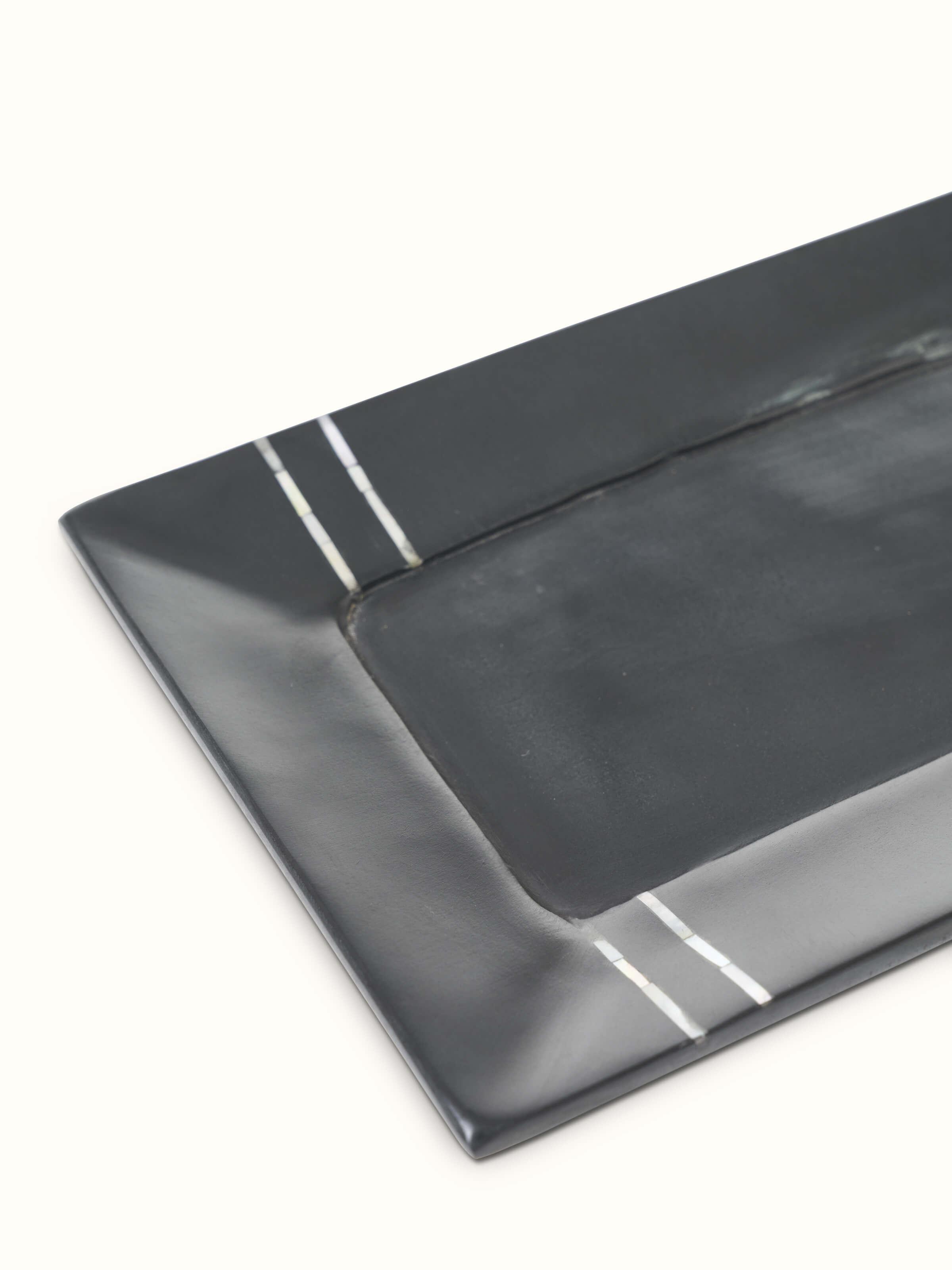 Back view of Carved marble stone bath tray in black color emphasizing the sleek marble design