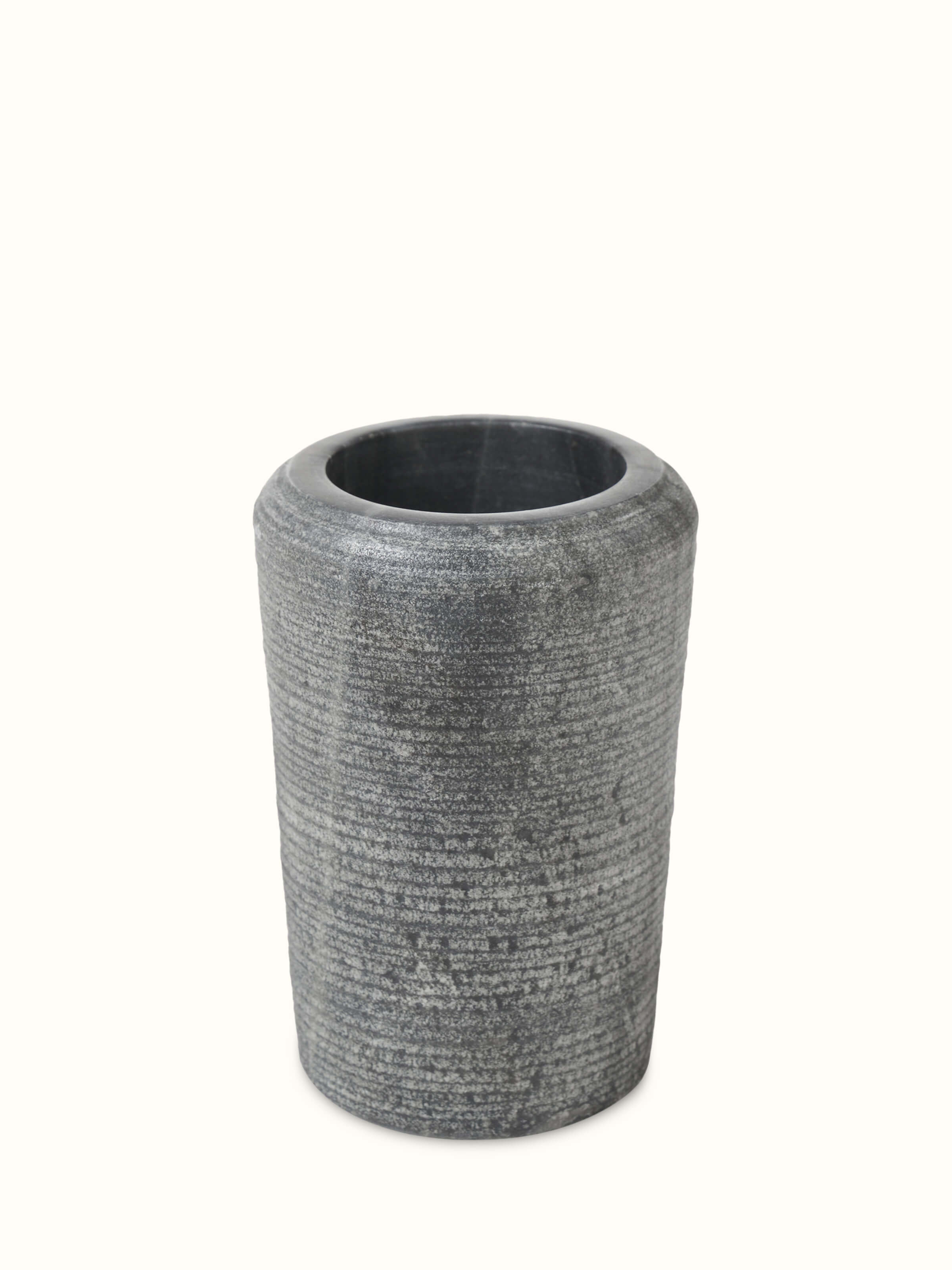 Angled view of Carved Marble Toothbrush Holder in Grey color emphasizing its marble texture