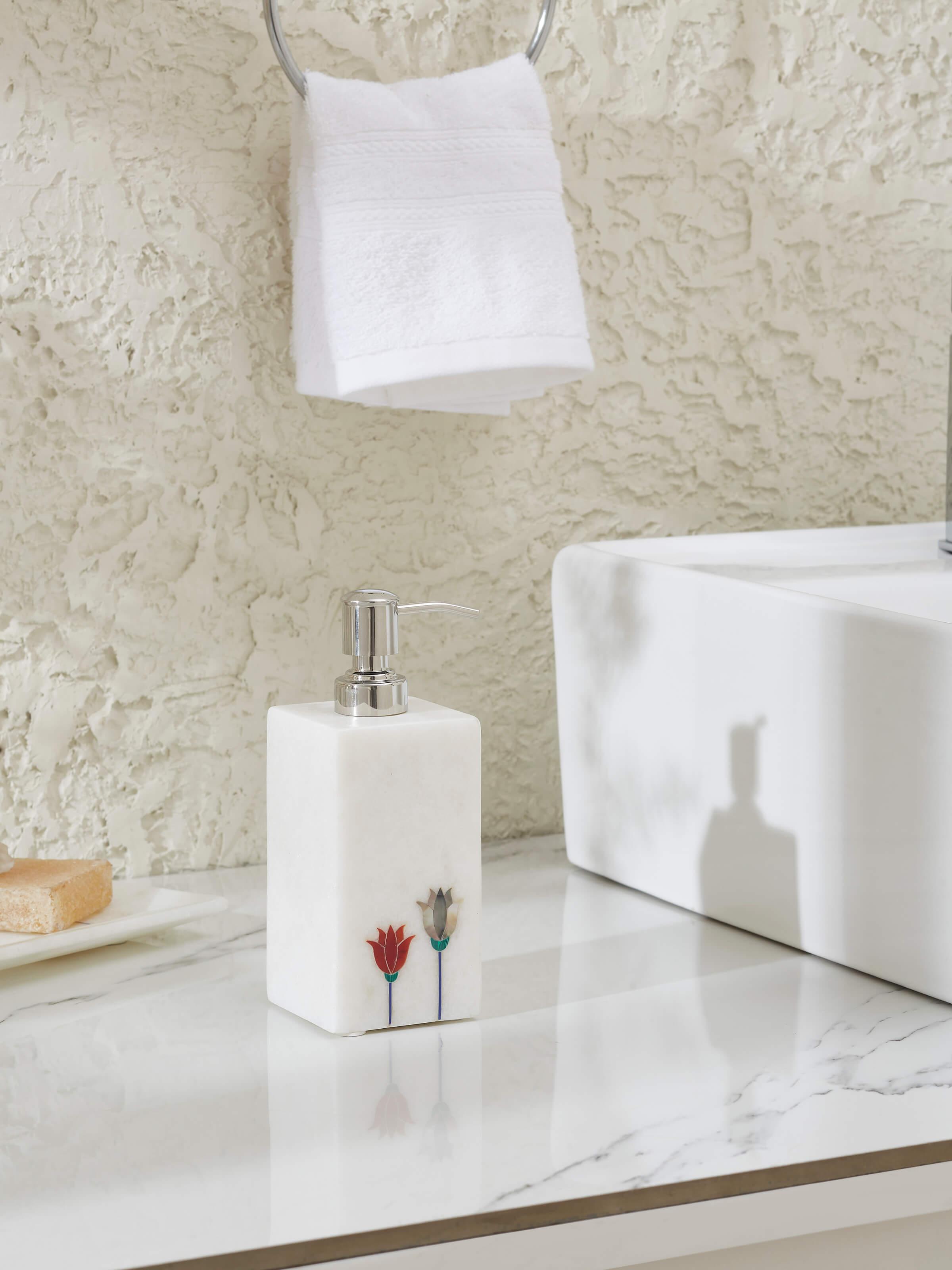 Side view of Carved Ambaji White Marble Lotus Soap Dispenser showcasing fine marble carving
