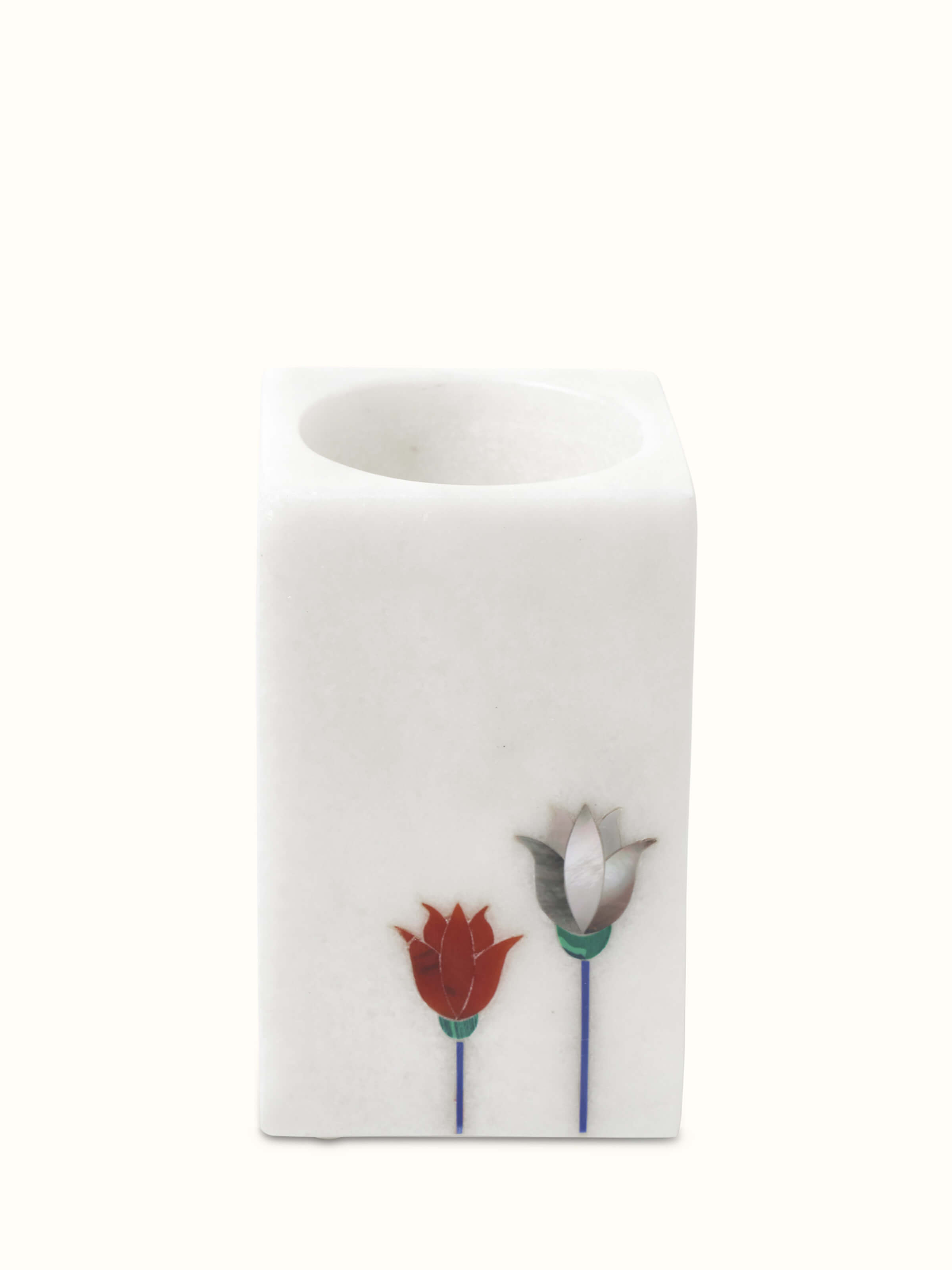 Detailed view of Carved Ambaji white marble floral toothbrush holder focusing on marble texture and carving.